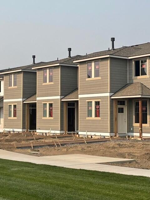 Amazing Parkside end unit townhome by award winning quality builder Pahlisch Homes in our much anticipated new Petrosa Community in NE Bend OR.  Visit PetrosaBend.com for overview. You will love the open concept kitchen/dining/great room with cozy gas fireplace and light/bright loft with skylights!  Quality finishes include: 6 inch baseboards, painted gray cabinets, Quartz counters throughout, stainless steel appliances, luxury vinyl plank flooring, full sized driveways,  double car garage with insulated garage roll up door,  near future park/amenites complex and much MORE!!   Photos are of similar floorplan in different community, specs vary. Front yard landscaping and AC included.  Heating and cooling through Mitsubishi heat pump zoned system. Homeowners and residents here will have access to a full spectrum of private recreational amenities including swimming pools, parks, green spaces, and paved paths by Summer 2023.