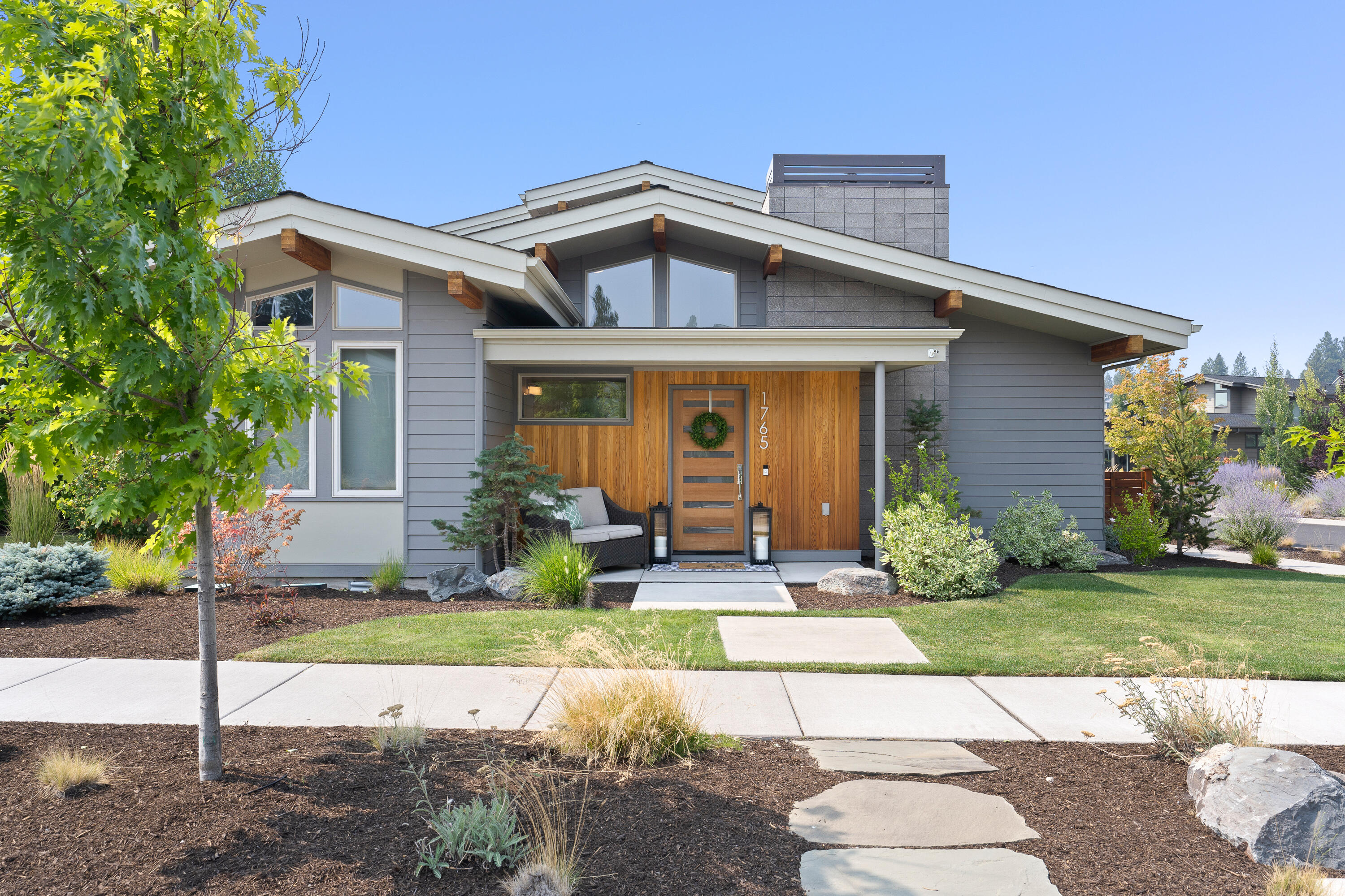 This gorgeous, light-filled contemporary home located in NorthWest Crossing will be sure to take your breath away. Step inside and you'll immediately be impressed by the
spacious great room, featuring a welcoming gas fireplace and floor-to-ceiling windows. The chef's kitchen is remarkable, offering tons of storage, expansive prep space,
and stainless steel appliances including the refrigerator. The main level of this stylish home also includes a wonderful master suite with en-suite bath. Upstairs you'll find
two bedrooms, a full bathroom, and a versatile loft space, perfect for a cozy library nook or extra storage. The thoughtful design of this home continues with countless
spots throughout the home for additional storage. Patios and a fenced and landscaped yard provide an ideal outdoor oasis for relaxation and entertaining. Plus, it's just
one block away from Discovery Park, and a short stroll to all the amenities that the heart of NWX has to offer.