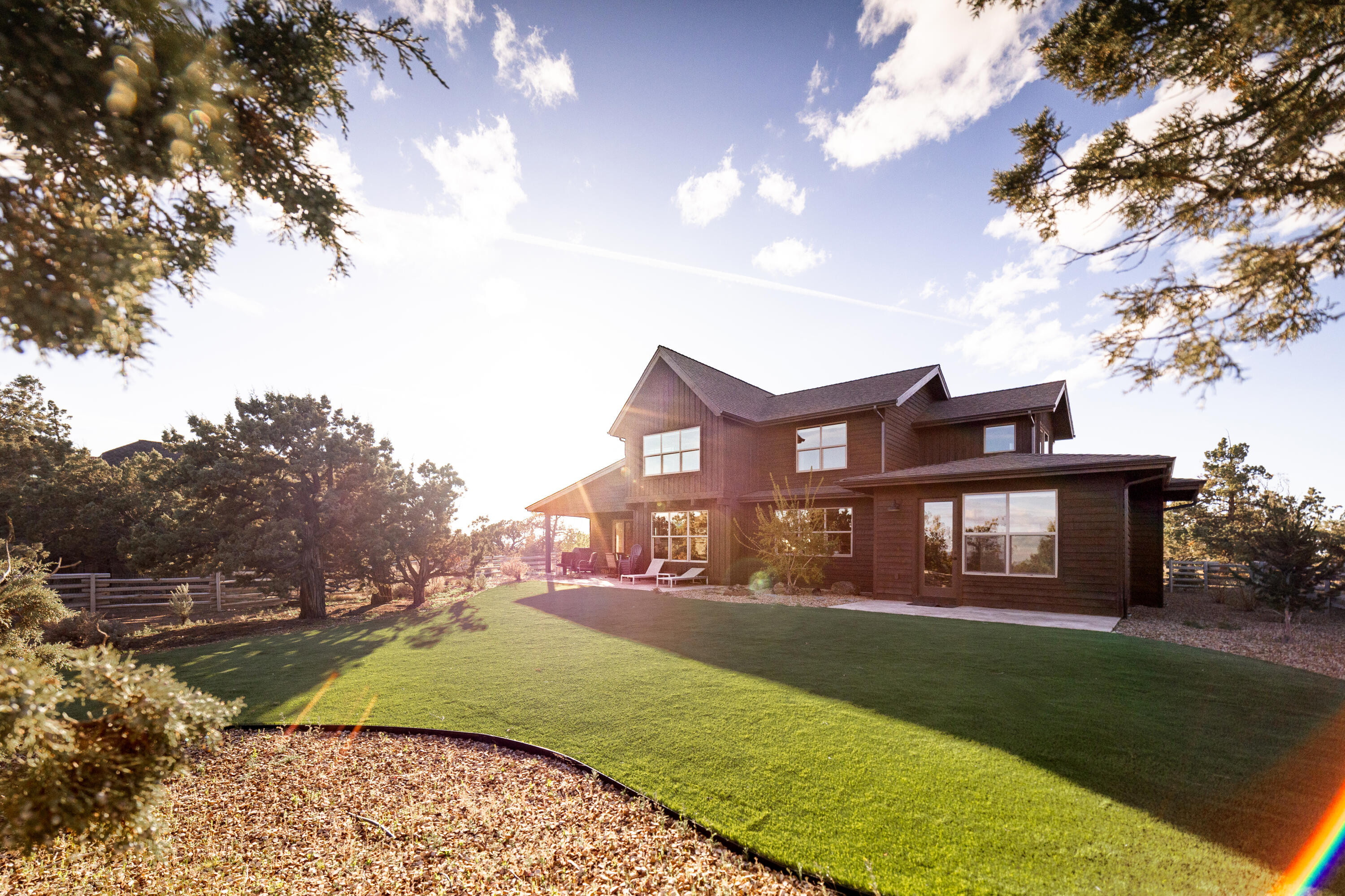 This thoughtfully designed home offers luxury living in the heart of Brasada Ranch's sought-after east side! Functionally set with five bedrooms, it effortlessly accommodates up to 15 guests, yet seamlessly transitions into a cozy three-bedroom retreat with an office AND bonus room. Rare among Brasada Ranch properties, this home features a fully fenced and turfed backyard, providing a private oasis for relaxation and play. Crafted with attention to detail, the residence showcases premium finishes including quartz countertops, hardwood flooring, and heated tile floors. With a 3-car garage, there's ample space to store all your recreational gear and equipment. Enjoy breathtaking views of the Sisters and Cascade mountains from multiple vantage points throughout the home! Conveniently located within walking and biking distance to pathways, the athletic center, pool, restaurants, golf course, and horse amenities; this home offers unparalleled access to the Resort's premier offerings!