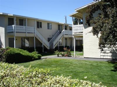 Incredible investment opportunity in Ashland! Twenty-one apartment units located close to SOU and Ashland High School. 18 Two Bedroom/1 Bath units with Range/Refrigerators. 2 Three Bedroom/1 Bath units, 1 One Bedroom/ 1 Bath. Off Street Parking, Laundry Facility on-site. Good rental income. Two tax lots. Account # 1-007689-1 and 1-007687-5, totaling 0.67 of an acre. Market Rents $575 per month. Some units at $500 right now.