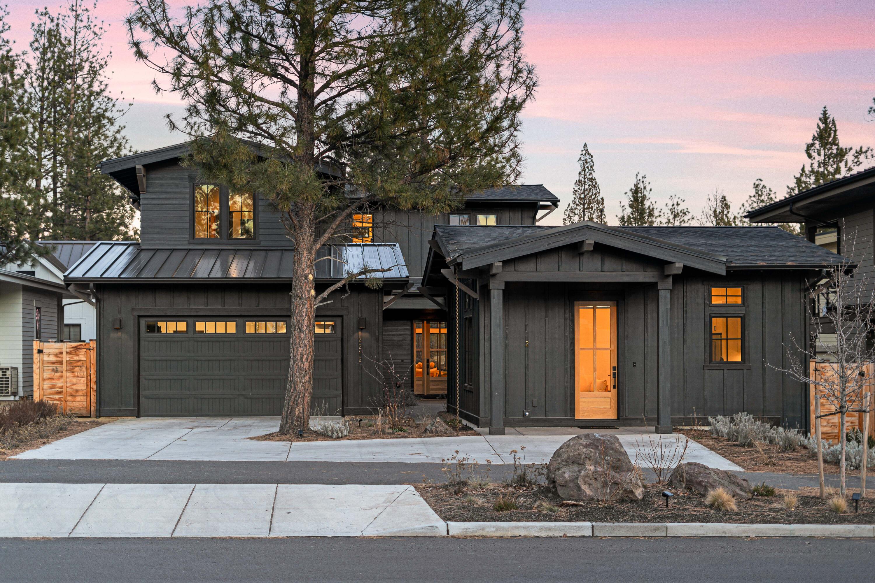 Welcome as you enter you're taken by the abundance of natural light, high-end natural real wood finishes & an amazing balance of modern architecture & contemporary design. This health-conscious custom home has more to boast as you look deeper; built in water filtration system, non-VoC paint & low-VoC flooring as well as EMF fabric in the walls, Wolf range in the kitchen, carrara marble throughout, Tesla charger and more! The back yard was thoughtfully designed by an herbalist, including; organic, native, medicinal and edible plantings. Beautiful large open spaces with thoughtful floorpan allowing for a work-out room, dedicated office & pre-planned for a hot tub & sauna just outside the primary suite on the main floor. The separate ADU has a full sized kitchen designed with high-end materials & appliances with living, bedroom, laundry &bath. All this in a wonderful COBA award winning builder community next to Northwest Crossing, Discovery park, restaurants, shops, schools & Phil's trai