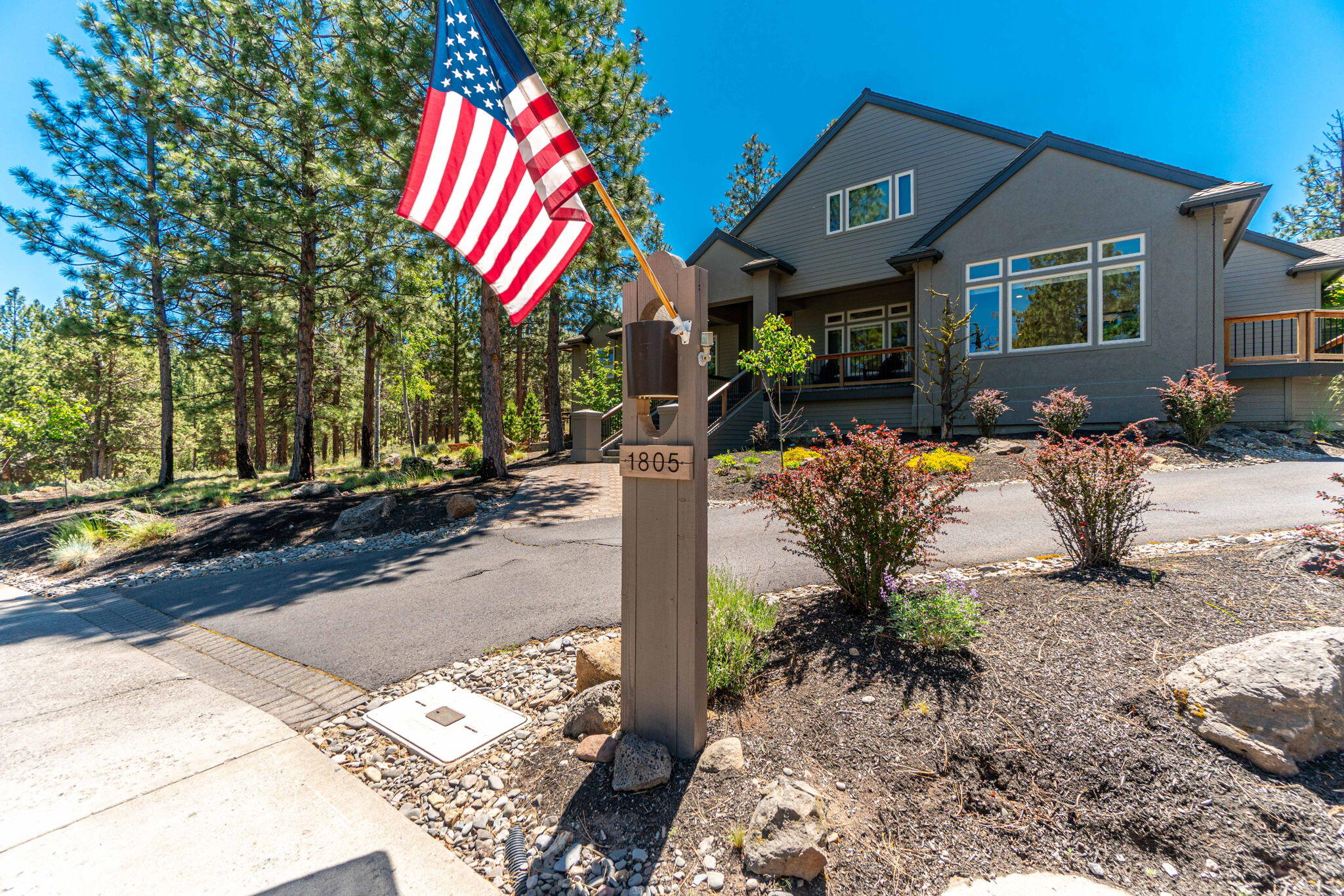 Welcome to 1805 NW Remarkable, a beautifully designed single-level home in the desirable Awbrey Butte in NW Bend. Situated on a sprawling 0.71-acre lot, this light-filled residence offers a seamless blend of indoor and outdoor living with a thoughtfully designed open floor plan, high ceilings, and neutral tones throughout.

The spacious kitchen is a chef's dream, featuring stainless steel appliances, a beverage fridge, a double oven, a 5-burner gas cooktop, and a large center island with leathered quartzite perfect for entertaining. Adjacent to the kitchen, the dedicated family room boasts built-in shelving, adding warmth and functionality to the space.

The home's ideal layout places three bedrooms on one wing, two of which are connected by a beautifully remodeled Jack and Jill bathroom, while the expansive primary suite enjoys its own private retreat on the opposite side, along with a dedicated office.  A private backyard space and 3 car garage round out this exemplary property.