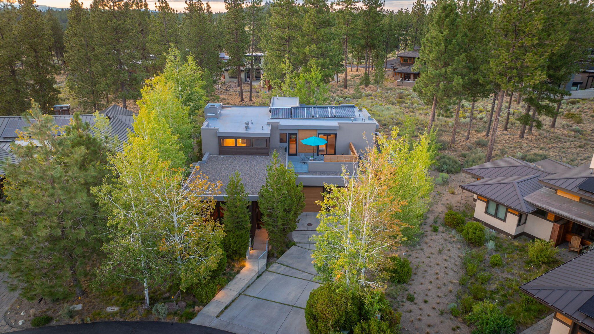 An architectural masterpiece in the coveted Westside community of Shevlin Commons. Step out your door & access miles of scenic trails at local's favorite, Shevlin Park. Designed w/the entertainer in mind, this exquisite energy efficient home features a Chef's Kitchen w/expansive quartzite countertops, wood slab island, banquette dining & professional grade appl including Fisher Paykel ovens, 8 burner Wolf range, & Subzero refrigerator. Spacious Dining Rm & fantastic bar w/Subzero wine fridge & kegerator. Floor-to-ceiling doors & windows off Dining overlook the tranquil front patio w/views of Mt. Bachelor. Great Rm w/warm wood accents, concrete flooring, gas fp & access to back patio: an outdoor oasis w/wood-burning fp. Main level artist's studio. Upstairs: Primary Suite w/spa-like BA, custom walk-in closet & private deck + 2 en suites, home office & rooftop deck w/hot tub. Oversized 3 car garage. An unmatched location for outdoor enthusiasts & minutes to Westside schools & amenities.