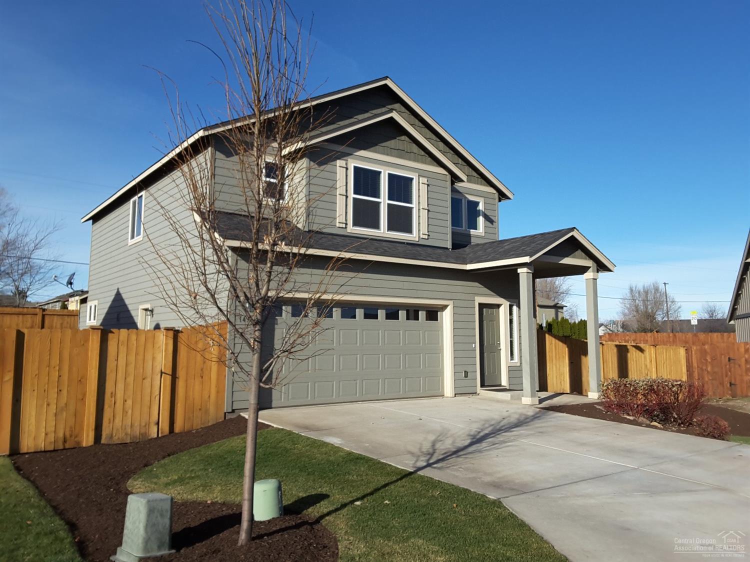 Black GE appliances, staggered birch kitchen cabinetry, penant lighting above the bar, tile entryway, gas fireplace with alcove and tile surround, raised bathroom vanities, standup shower with glass enclosure, lap siding, like new condition. Upstais utility room. Large spacious landscaped fenced yard, ingroud sprinklers. Seller is related to Listing Agent.