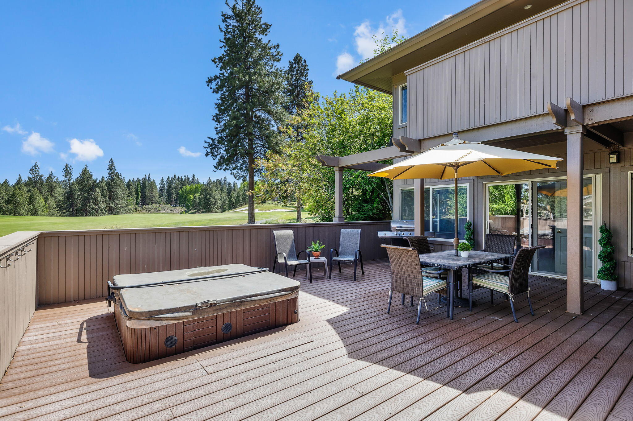 Short-term rental opportunity with incredible 18th Fairway views, this Broken Top Townhome is ideal as a full-time residence, seasonal snowbird use, or an investment opportunity. Located within the private, gated golf course community, a tranquil courtyard leads to the light filled interiors, showcasing full golf course views from the expansive great room and adjacent kitchen; each opening to the fully enclosed, spacious deck; the perfect venue for el'fresco dining, morning coffee or relaxing in the hot-tub. The vast upper primary suite can be easily locked off as a private owner's suite and enjoys a private outdoor balcony overlooking the golf course views. The second, main level primary suite, also takes in the golf course views and opens directly to the spacious hot-tub patio; each are perfect for soaking in the emerald-green golf course surroundings while relaxing after a full day of enjoying a round of golf, skiing the slopes of Mt. Bachelor or exploring one of the Cascade Lakes.