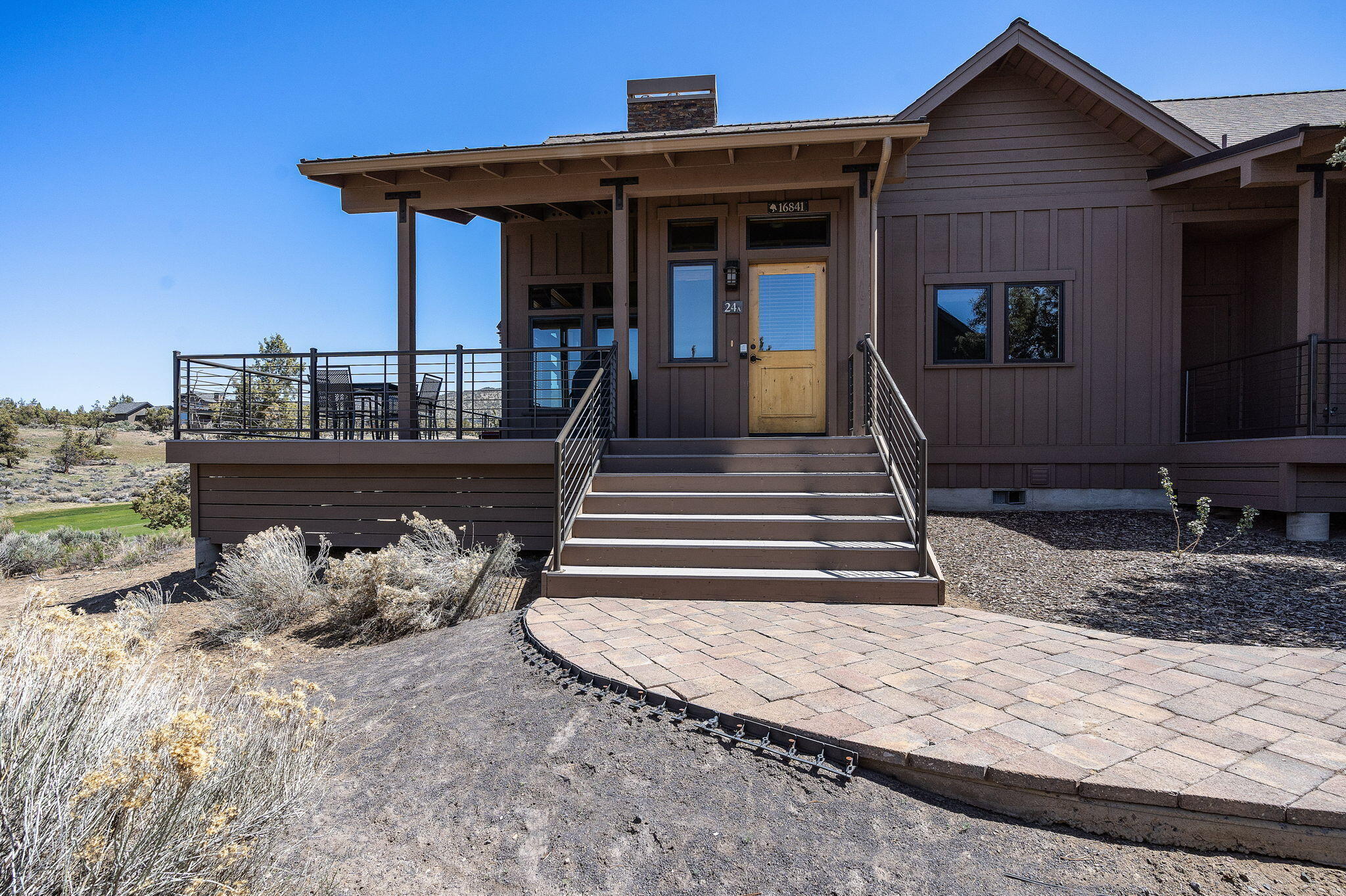 Beautiful four-bedroom cabin with contemporary finishes and a warm welcoming atmosphere. This cabin is in an absolute prime location within a very short walking distance to all the amenities Brasada Ranch has to offer. While overlooking Cascade Mountain peaks and the 10th fairway of Brasada Canyons Golf Course, you will experience ranch style living at its finest with lovely hardwood floors, inviting stone fireplaces, luxury furnishings, granite countertops with stainless steel appliances. The spacious deck is a wonderful place to unwind in the evening as you BBQ on the grill, relax, and enjoy the outdoor hot tub while catching Brasada' s famous sunsets. Enjoy all of the benefits of Membership; Athletic Center with multiple pools, waterslide and lazy river, equestrian center, 18-hole, award winning golf course, Spa Brasada, restaurants, hiking, biking and horse trail system, tennis courts, fishing and much more.