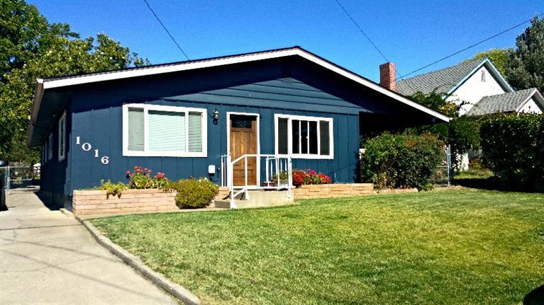 This Ranch style 3 bed 2 bath home sits on a large in-town lot of .22 acres, with a beautiful garden setting and has secure RV parking. There is a great covered patio for outdoor entertaining all year long, as well as a 12x16 storage shed with attached covered patio. Close to schools