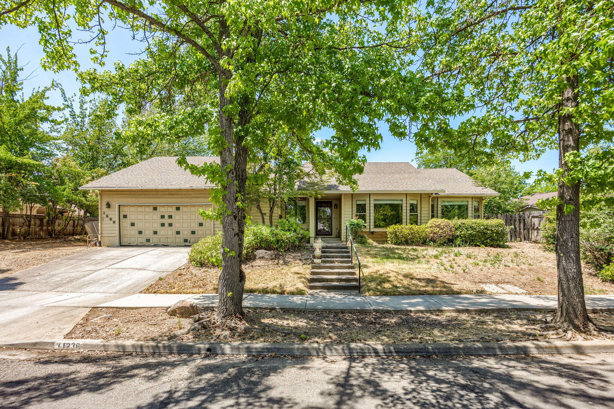 Looking for a flipper/fixer? Single level home w/great location and neighborhood close to the RV manor and Centennial golf course. Lg lot .23 acre w/RV parking. 1Vaulted beam ceilings in family room and living room w/double pane wood windows  and two bay windows. Updated kitchen w/quartz counters, large island, stainless steel appliances, 5 burner gas cook top, including refrigerator and large pantry. Gas log fireplace in family room with French doors leading to covered patio w/fenced backyard. Primary suite with lg shower, skylight and walk in closet plus a door leading out to another covered patio. Laundry room includes washer and dryer. 3 bedrooms, 2 bathrooms. Main bathroom has been updated with nice lg. tile around tub and shower and skylight. Selling in its AS-IS condition priced to sell below county assessment.