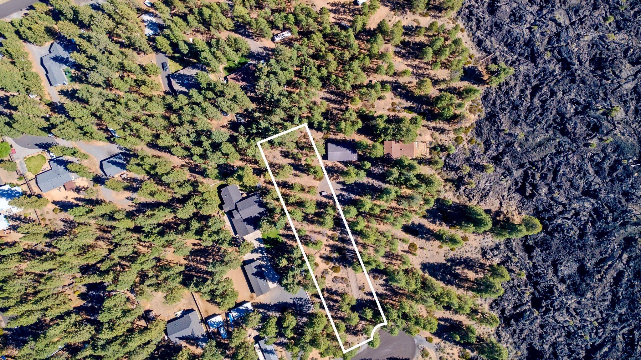 Please contact the listing agent before touring the property. Discover the untamed beauty of Central Oregon on this secluded .93-acre lot, set near the stunning Big Obsidian Lava Flow from the Newberry Volcanic Crater. Surrounded by mature pines, this Southwest Bend parcel offers privacy, natural shade, and a peaceful high-desert setting.
With direct access to nearby trails, lakes, and recreation, it's the perfect canvas for your custom retreat—whether you're building a cabin, getaway, or forever home in the heart of Central Oregon. This lot has a shared driveway with 60000 Agate Rd (MLS#220209795). A driveway easement would need to be established before closing if this lot is purchased separately from 60000 Agate Rd.