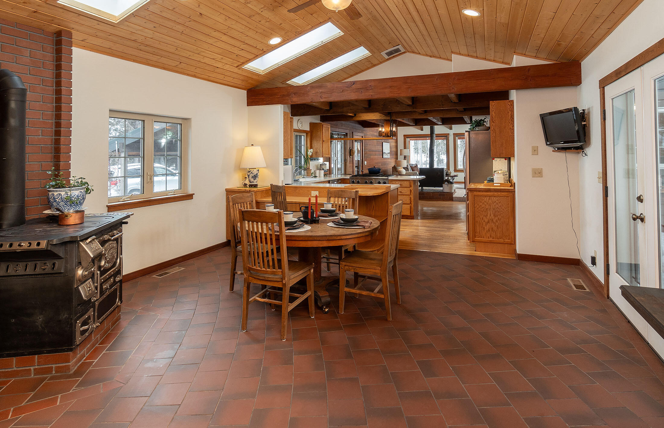 Just minutes from Sisters and Bend, this 3-bed, 3-bath retreat on 6.3 private acres offers the perfect blend of seclusion and convenience. The open floor plan welcomes you with bright living areas, expansive windows, skylights, and a greenhouse-like hallway, seamlessly bringing the outdoors in. The main-level primary suite features its own stunning rock fireplace, creating a private escape, while the upstairs bedrooms offer a comfortable yet separate retreat for guests. Outside, Trex decking wraps around the home, providing the perfect space to unwind. Towering pines and junipers offer privacy while framing peek-a-boo mountain views. The level lawn and expansive outdoor space invite endless possibilities—gardening, entertaining, or even horses. This is more than a home; it's a peaceful sanctuary waiting to welcome you.