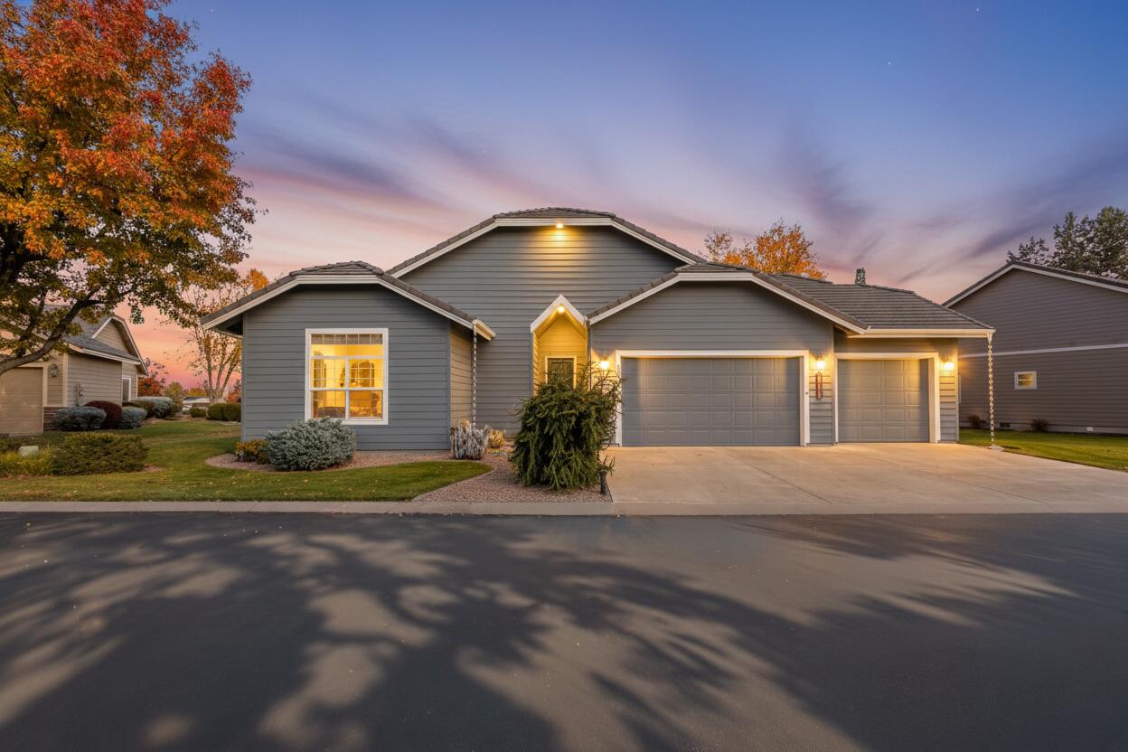 Amazing Canyon Views from your covered back Deck! Overlooking Redmond's Dry Canyon in the Cliffs All ages Gated Community. Move in Ready with newer exterior paint, tankless water heater, blinds & flooring. Single Level with Spacious 10 ft Ceilings throughout. 3 Car Heated garage. 2 Gas fireplaces in Primary Bedroom and Great Room. HOA covers Landscaping Maintenance front and back yard. Schedule a Showing Today! County records indicate 3rd bedroom as an office, which is it's current use. Some photos are Virtually Enhanced by AI.