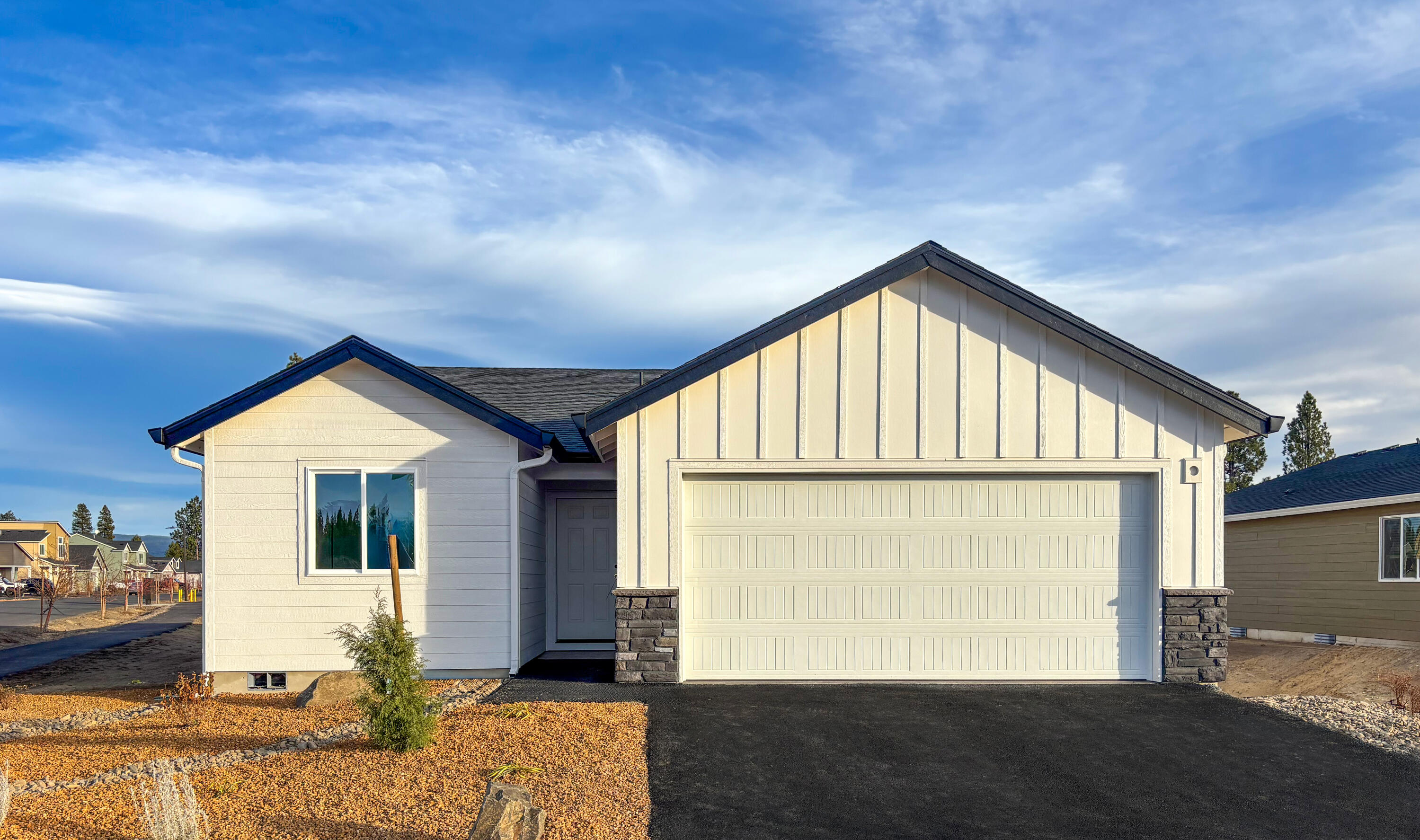This new construction home is Move-In-Ready! The Daisy plan is a three-bedroom home that offers the convenience of single-story living. Off the foyer are two bedrooms and a full bath, leading to an open-concept layout that combines the kitchen, great room, and dining area. The primary suite is tucked into a private rear corner and features an en-suite bath with a double vanity and a spacious walk-in closet. Interior highlights include quartz countertops, shaker-style cabinetry, and luxury vinyl plank flooring in the kitchen and bathrooms. This home also includes central AC, a refrigerator, a washer and dryer, a xeriscaped front yard with a drip irrigation system, and blinds—all at no extra cost! Homesite #138. Rendering is artist conception only. Photos are of a similar home, features and finishes will vary. Taxes are not yet assessed.