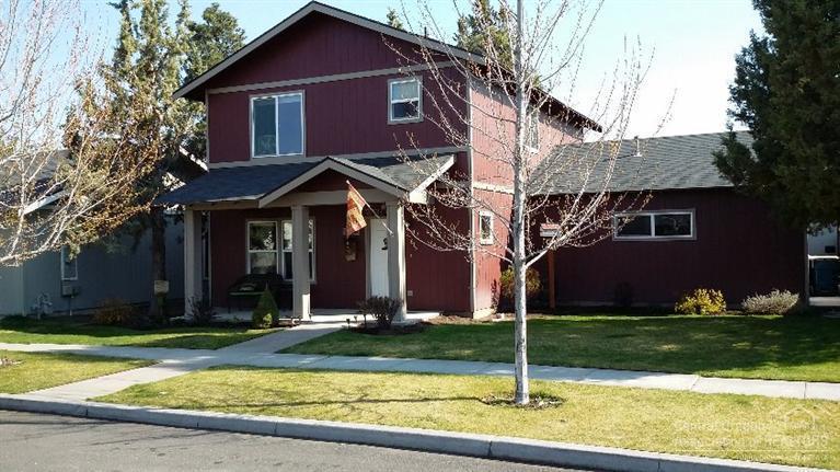 Larkspur neighborhood beauty in SE Bend offers 1692 sf of living space with 3 bedrooms and 2 1/2 bathrooms. Gorgeous fully fenced back yard with a custom built greenhouse adds to the allure of your outdoor living space. Gas fireplace in living room. All bedrooms upstairs. Large walk-in master closet. Double sinks in master bathroom. Tree lined street, alley access. Two car garage with a built-in enclosed shop area for your projects.