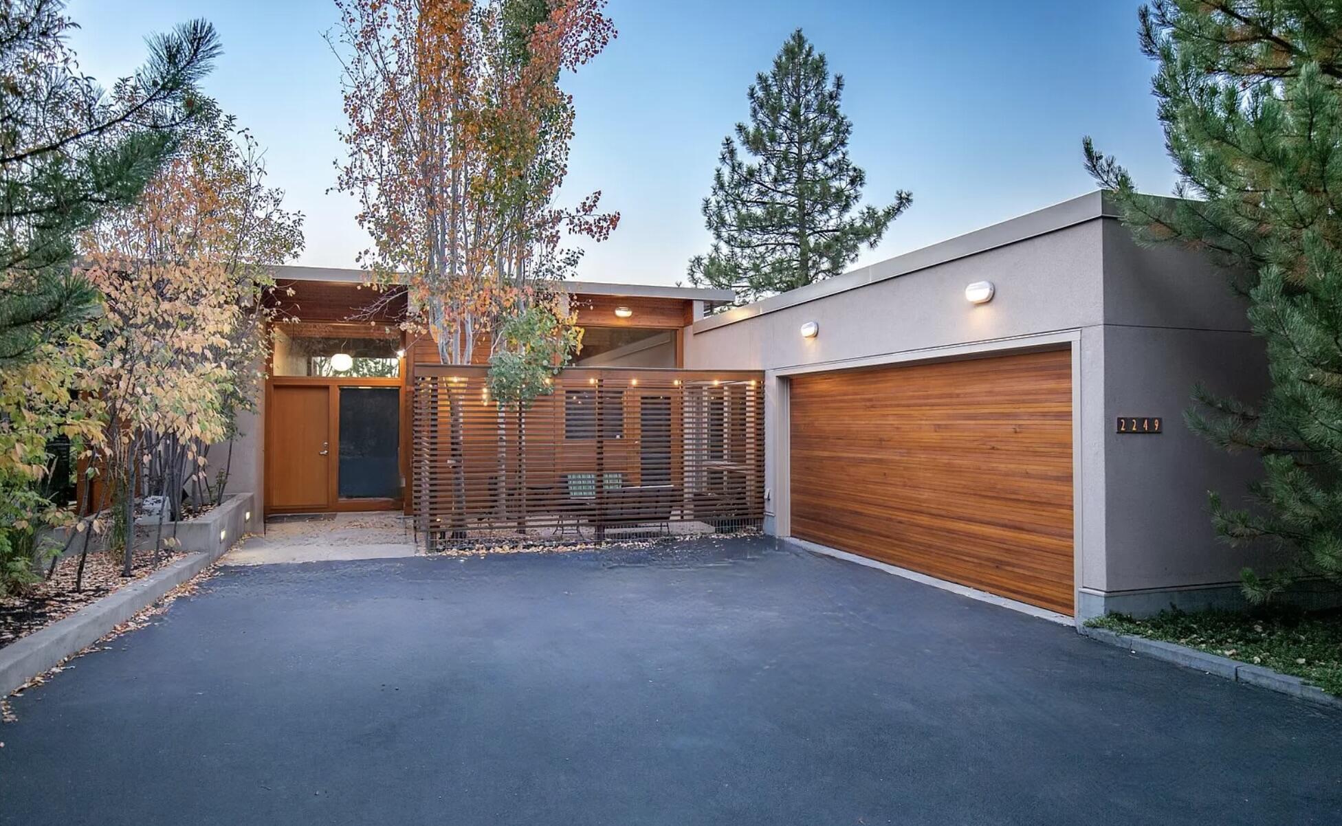 Discover the perfect ''Lock-and-Leave'' vacation home on Bend's west side, offering the ultimate in easy living! This newly updated townhome blends luxury with convenience, featuring new interior paint, LED lighting, Lutron smart outlets, a modern kitchen island, and upgraded appliances. The primary suite boasts plush carpeting and a new bidet, while the guest bedroom/office includes custom bookcases. Additional highlights include a butler's pantry, new porch heaters, and an electric dog fence for added security. Located in the sought-after Shevlin Reserve, this home provides partial Cascade Mountain views, radiant heated concrete floors, and 2 outdoor spaces ideal for entertaining or relaxing. 5 minutes from Shevlin Park, 28 to Mt Bachelor and only 26 to the Redmond Airport.  Don't miss this opportunity to elevate your vacation lifestyle!