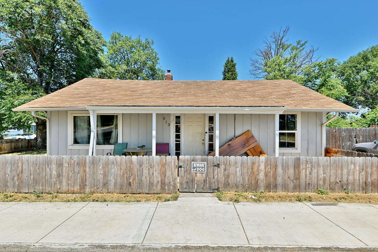 Great opportunity for investors or first-time buyers. This well-maintained 2-bedroom, 1-bath home offers 848 sq ft of functional living space with solid wood flooring in the main living area and fresh interior paint throughout. The sunny eat-in kitchen provides generous cabinet storage and direct access to the back deck through the sliding glass doors—ideal for tenant appeal or personal enjoyment. A designated laundry area and fully fenced yard Improve overall convenience and usability. A solid addition to any rental portfolio or an excellent entry point into homeownership. Schedule a showing today!