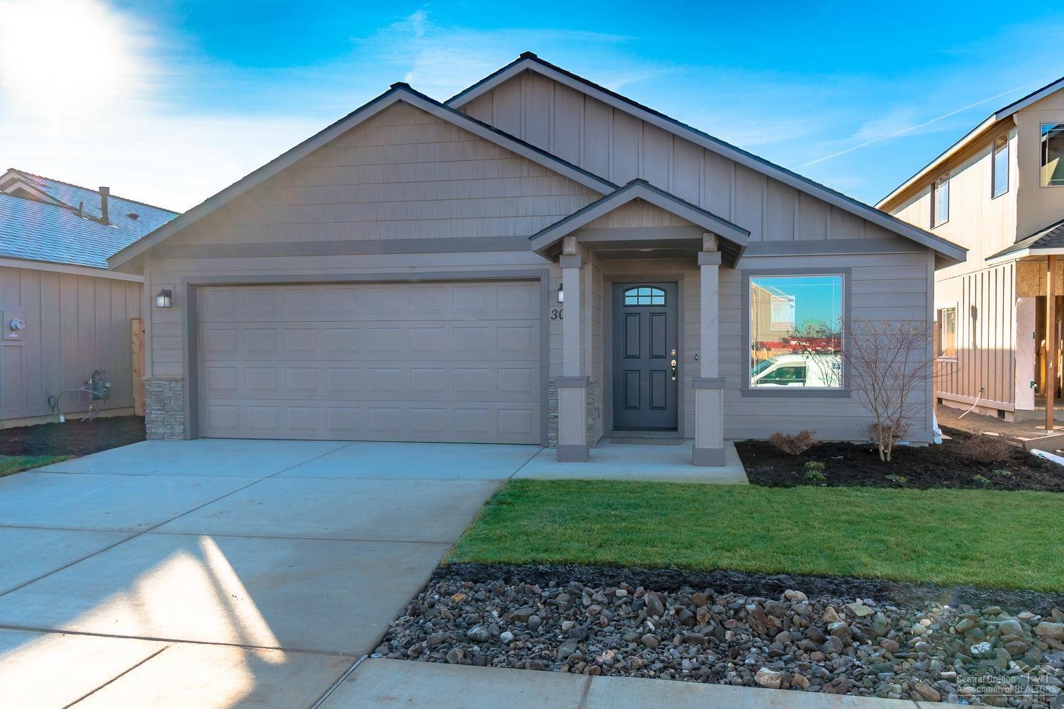 Our current model w/Cascade Views! 3 bedrooms, 2 baths, 1,662 sf w/tons of windows. Lg great room w/ cozy gas burning fire place, open to dining w/eating bar, Quartz slab counters in the Kitchen, full height custom tile back splash. SS Energy Star appliances, lg corner pantry. Den w/dbl doors off entry. Spacious bedrooms, huge walk in Master closet, dbl sinks in both baths. Natural gas, forced air high efficiency furnace, AC to be installed. Dbl garage w/cultured stone accents, covered front & back patios for year round entertaining. Front is landscaped w/sprinklers, 6'cedar fence all around. Model home @ 3020 NW Cedar Ave. open 11-4pm Thurs-Mon.