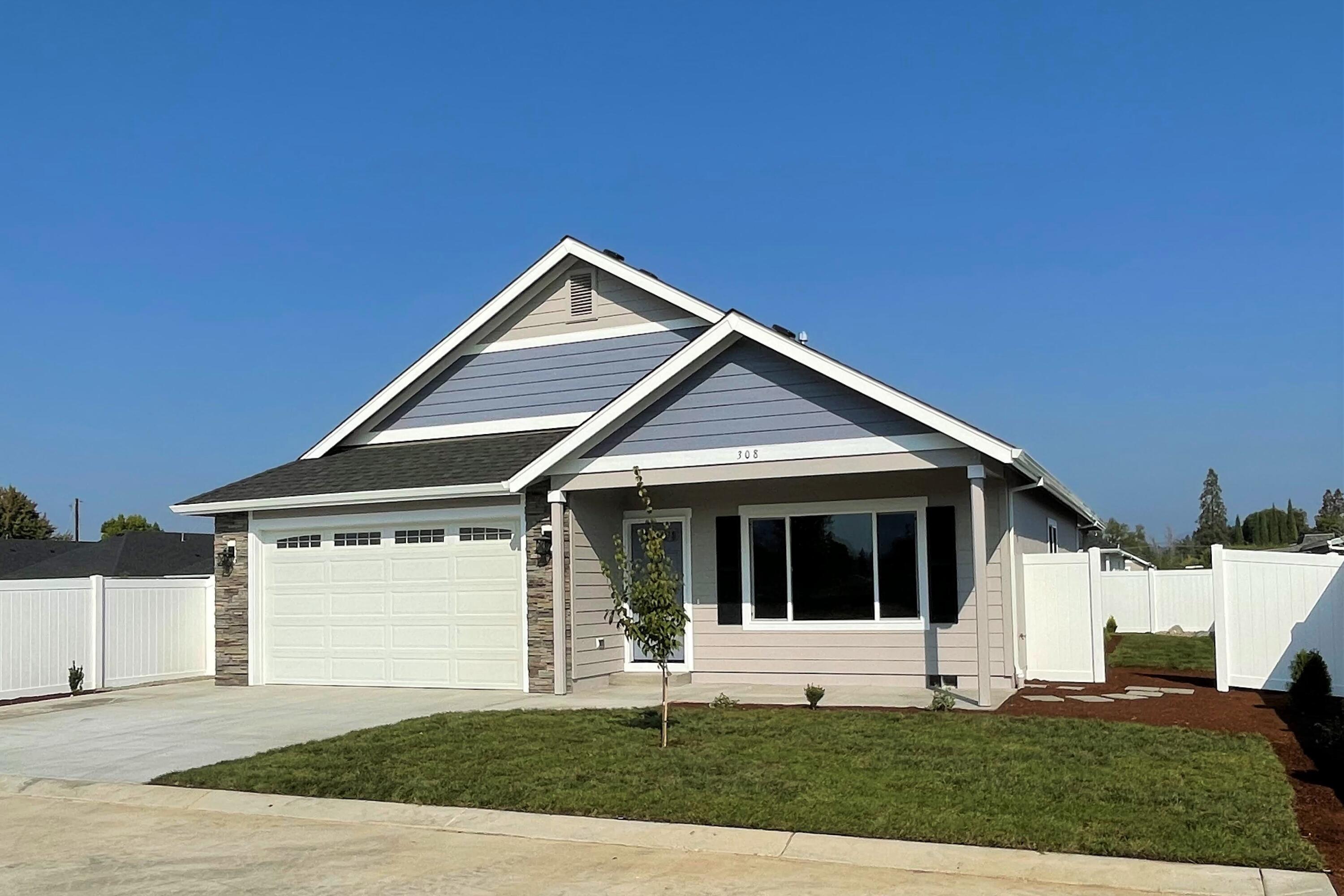 Brand new home in lovely Blackberry Glen! Ask us about premium-service financing below the current mortgage rates. Most interior photos of a prior listing of the same model. Home includes 9 foot ceilings throughout, granite counters & lots of extra storage. The granite, breakfast bar kitchen with custom hickory cabinets & pantry includes stainless steel appliances with microwave hood over the gas range/oven. Master bedroom and bath with dual sinks and large walk-in closet. There's a spacious garage with upgraded 8 foot high garage door and premium, no maintenance, white vinyl fencing.  Access to private, wildland park just a few doors away. Country location close to Schroeder Park on the mighty and majestic Rogue River with rural feel yet with city services and District 7 schools. A no marijuana grow zone, Blackberry Glen is a designed, Pocket Neighborhood-style development for enhanced living enjoyment and sense of community. CALL FOR A LOOK INSIDE TODAY!