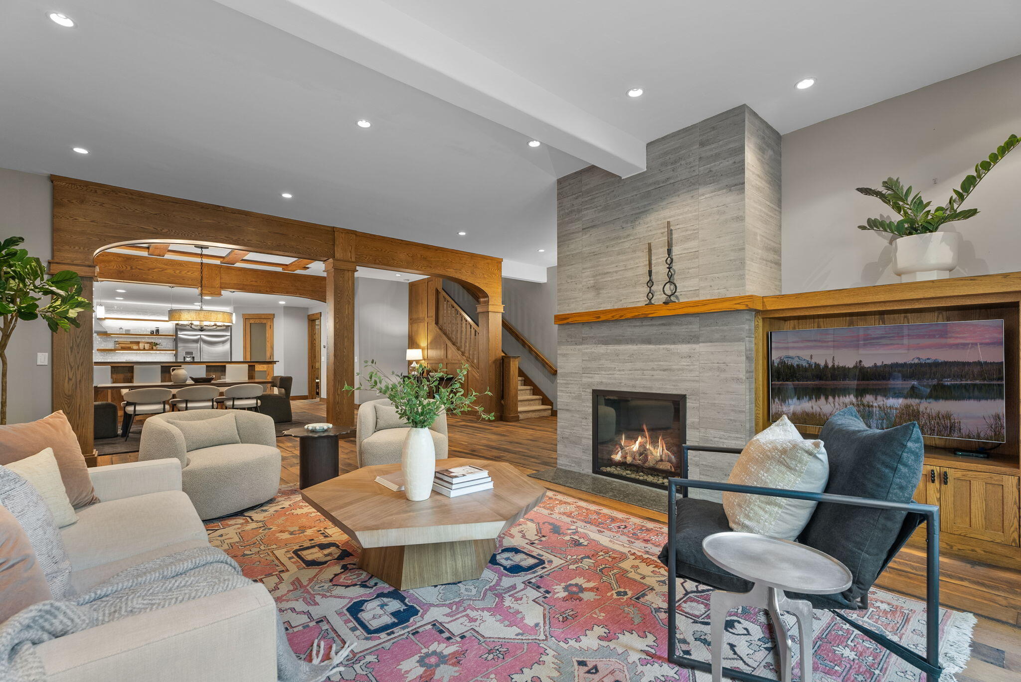 Discover this exquisite contemporary townhome in the heart of NorthWest Crossing. Boasting 2974 square feet, this residence offers both space and comfort. Inside you'll be greeted by an open and airy floor plan with lofty ceilings, complemented by rustic white oak hardwood floors. The kitchen is a chef's dream, featuring honed quartz countertops, a Thermador range and hood, a built-in refrigerator, and a pantry. The primary bedroom is a grand retreat, complete with a cozy sitting area, a private balcony, and a luxurious bath that includes a soaking tub, and a walk-in tile shower. The other 2 bedrooms have ensuite baths and direct access to a private balcony. For added versatility, a loft space can serve as a home office or workout area. Step outside to the patio, equipped with a built-in gas BBQ, making it the perfect spot for entertaining guests. The oversized 2-car garage is a storage enthusiast's dream, complete with a 220 EV car charger. Schedule a visit today to see this stunner.