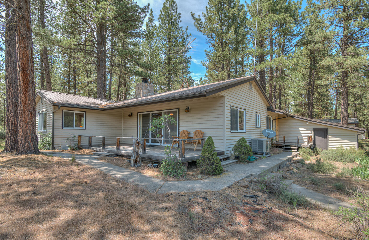 Stunning river views from this well-maintained 3-bedroom, 2-bath home perched on a high bank above the Deschutes River, complete with private boat dock access—a rare and valuable find! This property features durable vinyl siding and windows, a long-lasting metal roof, an oversized RV garage, a detached shop, an RV pad, and an additional storage building. A fantastic opportunity for buyers looking for a turn-key home that offers space, functionality, and unbeatable riverfront living.