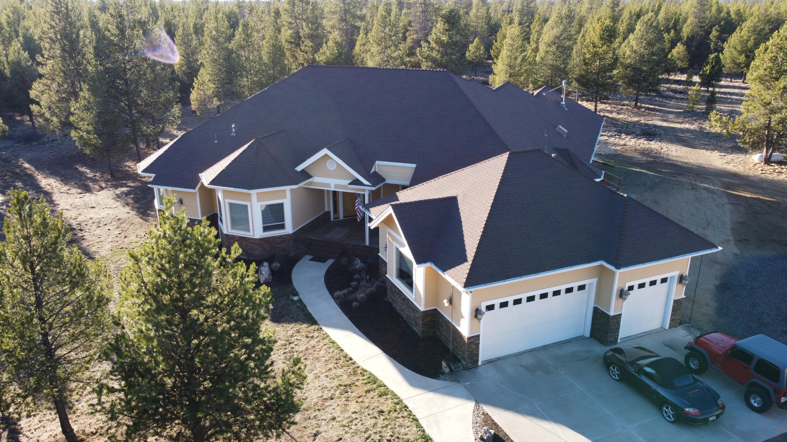 Welcome to this spectacular multigenerational oasis, located just south of Bend & only minutes from Sunriver. 4038 of single level living on 18.67 acres. Enter from the spacious front porch to the open living & dining rooms w/ 9 ft ceilings throughout.  Gourmet kitchen w/ a 34 cu fridge & freezer & 48'' Dacor gas range, Prep-station w/ addl' sink, bev fridge & ice maker w/ pass thru to the outside BBQ. Breakfast nook, Family room,  HUGE bonus room, & ALL season room! Don't forget the office! Master suite with dual bathrooms plus three w/in closets & still room for a baby grand piano! 2nd and 3rd bedrooms w/ dedicated bath are at the opposite end of the house. Enjoy your hot tub after a workout in the swim spa pool. Fire pit & enclosed playground. 1800 sq ft shop w/ 400 amp service & rooms that could be used for any number of things - come take a look. Gated front entrance. 3 car garage. RV parking. New Well. Video & Alarm system. Enjoy this video https://vimeo.com/651384825