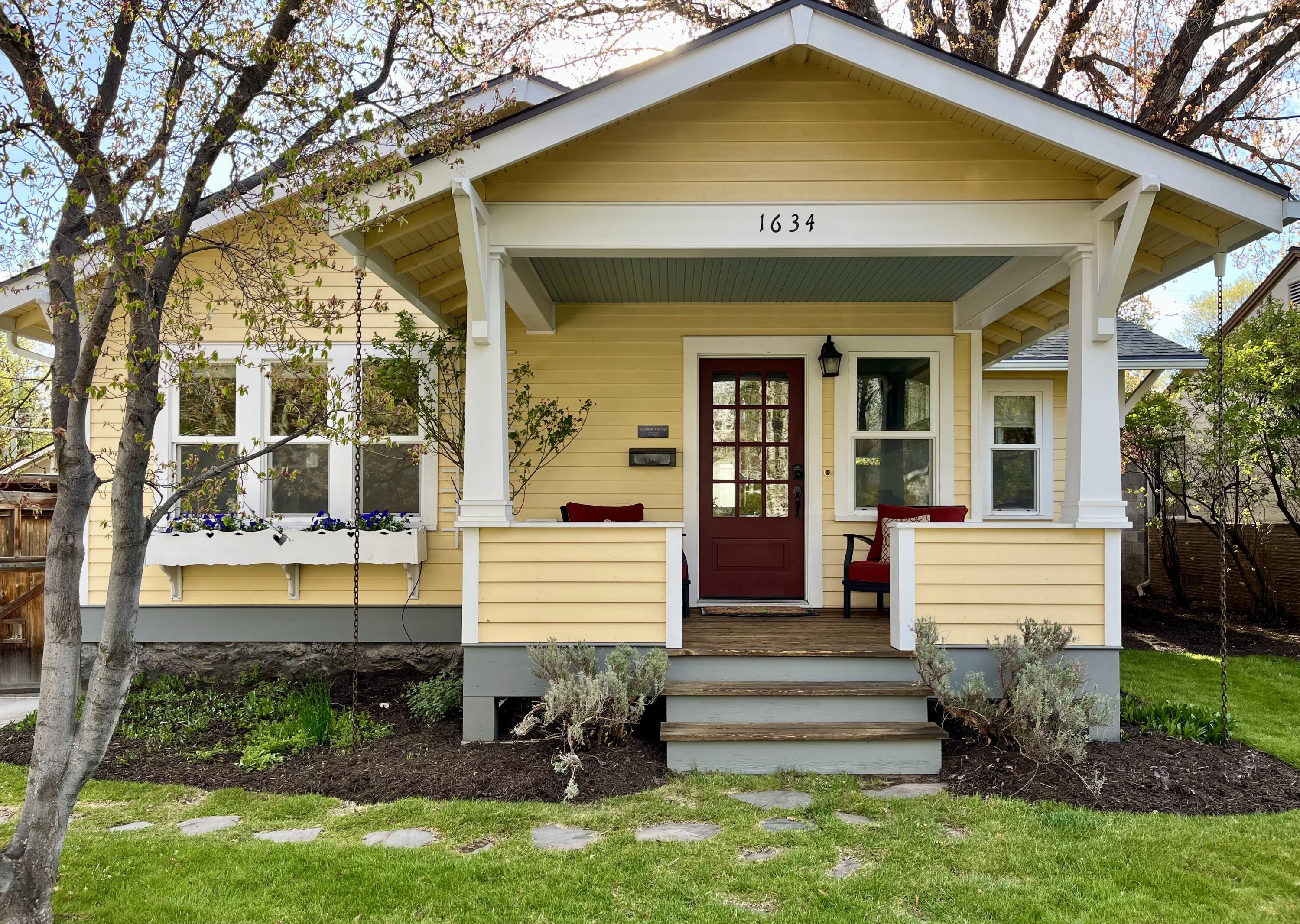 Legacy short-term rental within walking distance to First Street Rapids, Deschutes River Trail & Downtown. Built in 1925 in Bend's first platted neighborhood Sunshine Cottage was completely gutted, remodeled & expanded to current codes creating the perfect blend of modern functionality & vintage charm. Enjoy quick access to trails, restaurants & shopping from this prime Westside location. The home features a light-filled open floor plan with chef's kitchen complete w/subzero refrigerator, hand-crafted cabinets & butcher block countertops. New tankless water heater, radiant floor heating and wood-burning stove ensure comfort throughout the seasons. The detached garage provides substantial storage for all the Central Oregon toys or imagine a game room or an ADU. Ample storage solutions continue w/a RV/boat pad. Situated on a quiet street, this home is an exceptional opportunity for those seeking idyllic residential living, a charming pied a terre or a short-term rental.