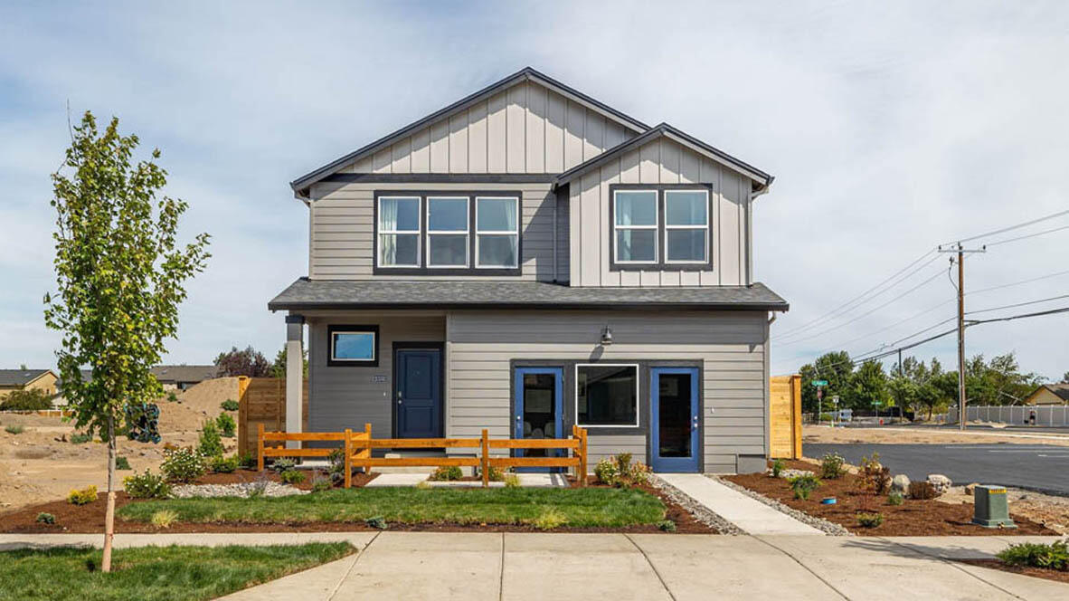 Special low interest rates and closing cost incentives with builder's lender!!  Move in ready home in Bend! Visit Monrovia, a charming community near Sun Meadow and Alpenglow Park, with easy access to nearby shops, restaurants, and schools. The Ballard floor plan is a versatile two-story design featuring 5 bedrooms and 3 baths, including a main-floor bedroom and full bath perfect for guests or a home office. Entertain in style in the formal dining room or relax in the great room with a signature color-changing fireplace and floor-to-ceiling painted accent wall. The chef's kitchen features shaker cabinetry, quartz countertops, and large island. Upstairs, a loft provides additional space for a playroom or entertainment area. The primary suite bath features a spa-like retreat with a soaking tub, walk-in shower, double vanity, and walk-in closet.  Call for details. Open Wed - Sun 10:00AM - 5:30PM.  Mon/Tue by appt. Photos are representative of the plan; features & specs may vary