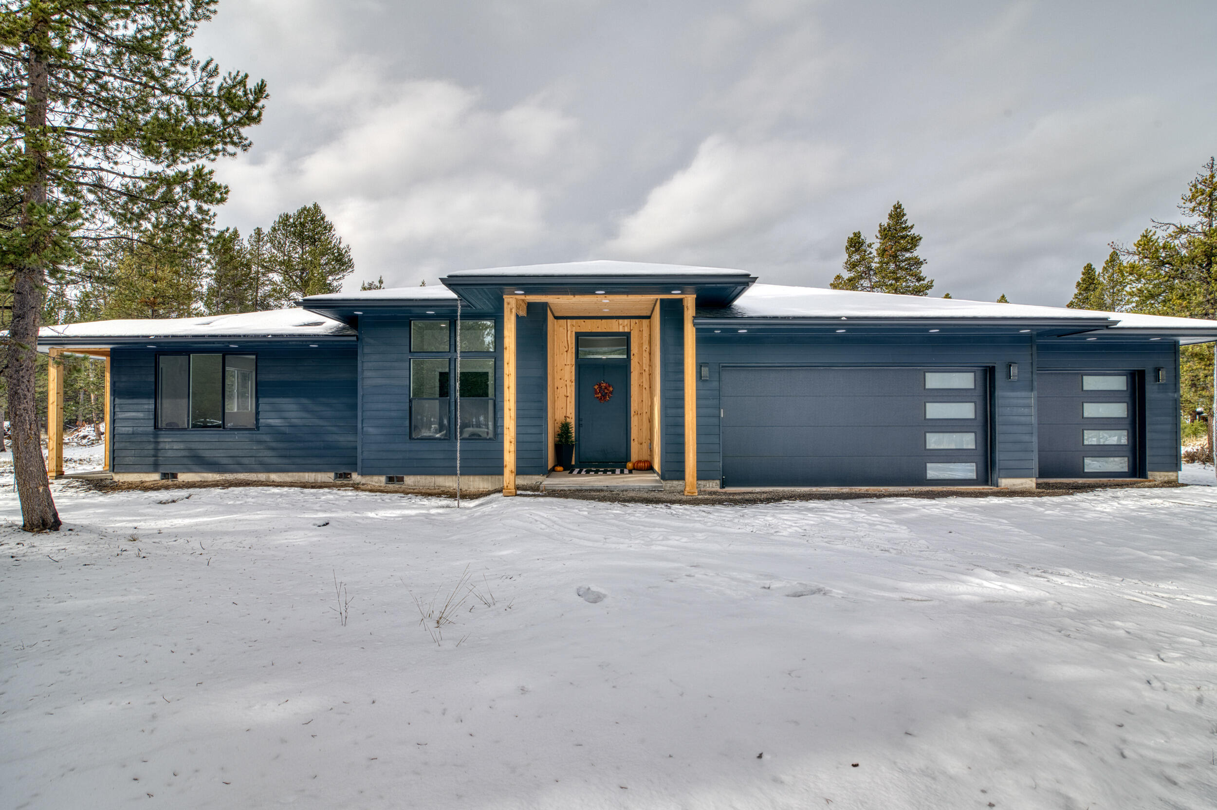 Seller to credit buyer $20,000 for closing costs, rate buy down or finishing touches to the property. (Paint shop, landscaping, fence) New ranch home on almost on acre. 2400 sq.ft. shop with 200 amp service. 4 bed/3 bath. Large kitchen with island. Side bar with 2 drawer fridge and ice maker. All ready for your outdoor kitchen. Plumbed for a sink and propane BBQ as well as ready for propane heaters on the large covered back patio. Beautiful tile shower in primary bath with dual shower heads. Large soaking tub and prewired for a sauna. Wired for hot tub right out of the primary bedroom. Lineal propane fireplace. One of the bedrooms has an outside entrance and a kitchenette, bathroom and walk-in closet. Oversized attached 3 car garage with plumbing for a dog wash station. Fenced dog kennel. Shop has 14' tall & 16' wide door with opener. Sale includes 75'' Samsung Frame TV and couch and rug in great room. Seller is a licensed agent in Oregon.
