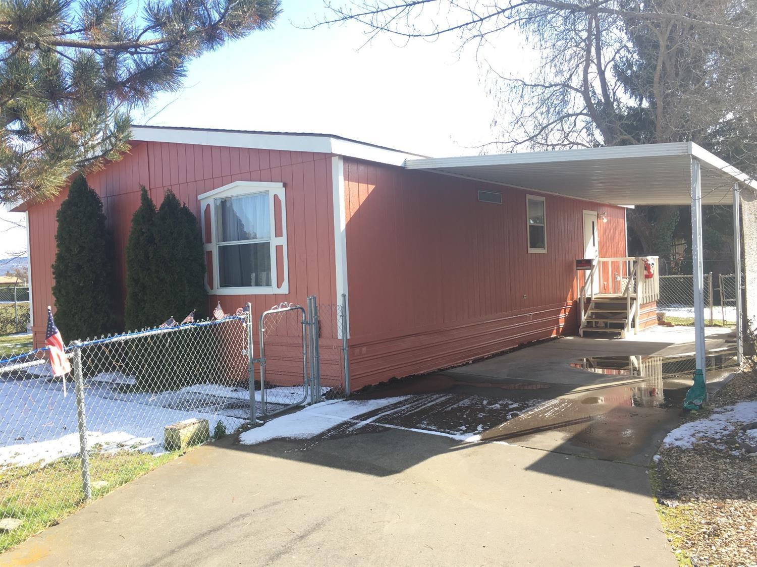 Very nice 3 bedroom, 2 bath home on a large fenced space with lots of privacy. Open pastures grace the view from the front porch along with the large yard. Lots of storage throughout the house. House shows larger than the square footage. New exterior paint, 5 year old roof. Home sold as is.