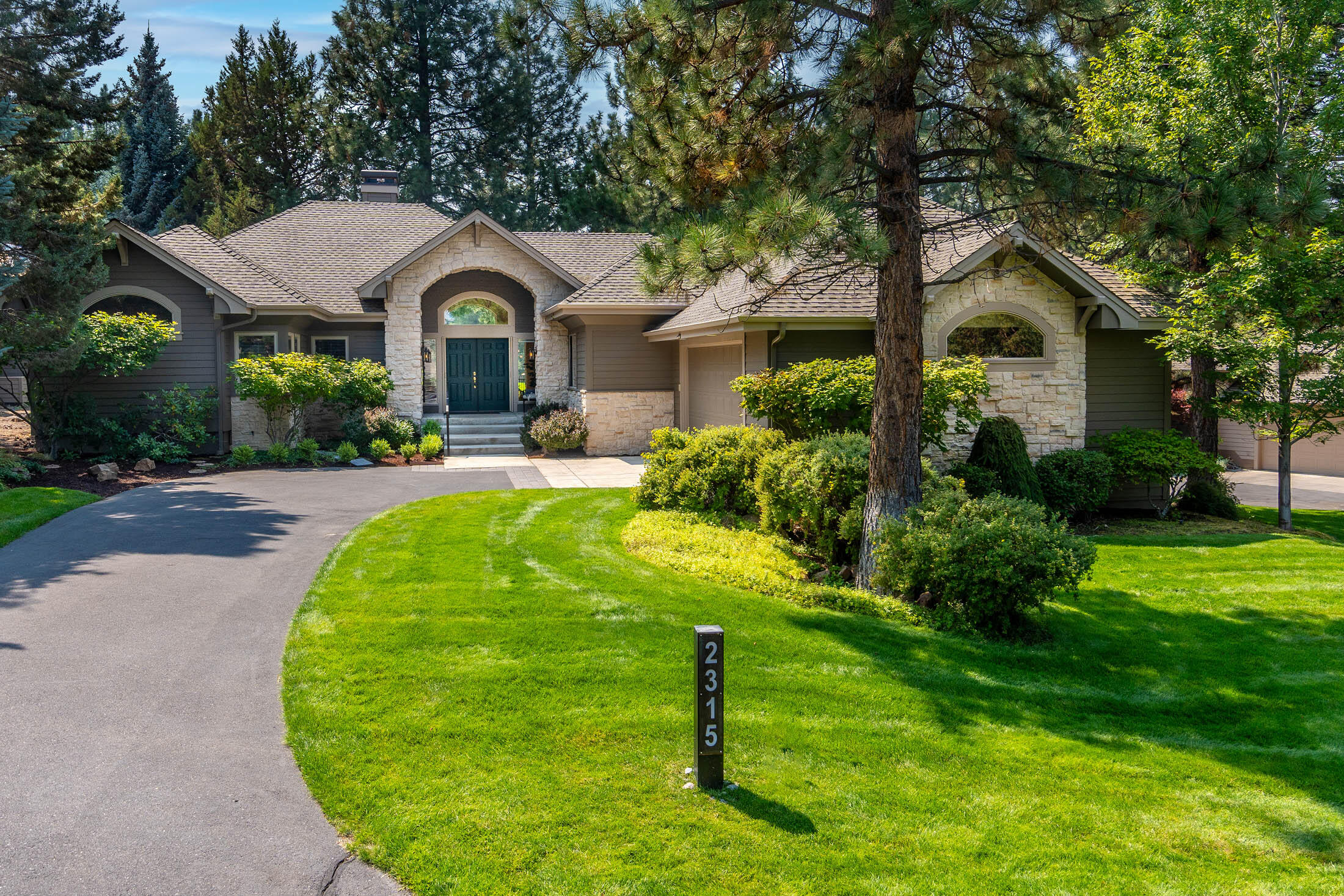 Located on a quiet cul de sac & overlooking the 11th fairway, this wonderful single level home is in the premiere gated community of Awbrey Glen.  Designed by Neal Huston, the setting captures unobstructed views of the lush greens through large floor to ceiling picture windows & inspires a sense of calm.  Spacious & open GR has vaulted ceilings, new LVP flooring, gas FP & wood built-ins. The GR opens to the spacious fenced trex deck overlooking the meticulously landscaped fairway. Open kitchen w'stone flooring, granite slab counters & kitchen island w' bar seating, stone backsplash & all new SS appliances. Whether you are hosting a gathering or enjoying a quiet evening, the open layout creates a seamless transition between indoor & outdoor living spaces.  Two of the bedrooms are suites & have good separation. The primary has large windows facing the fairway & the updated spacious bathroom has a tile floor & walk-in stall shower, jetted tub & dual vanities. Oversized 2 car garage.