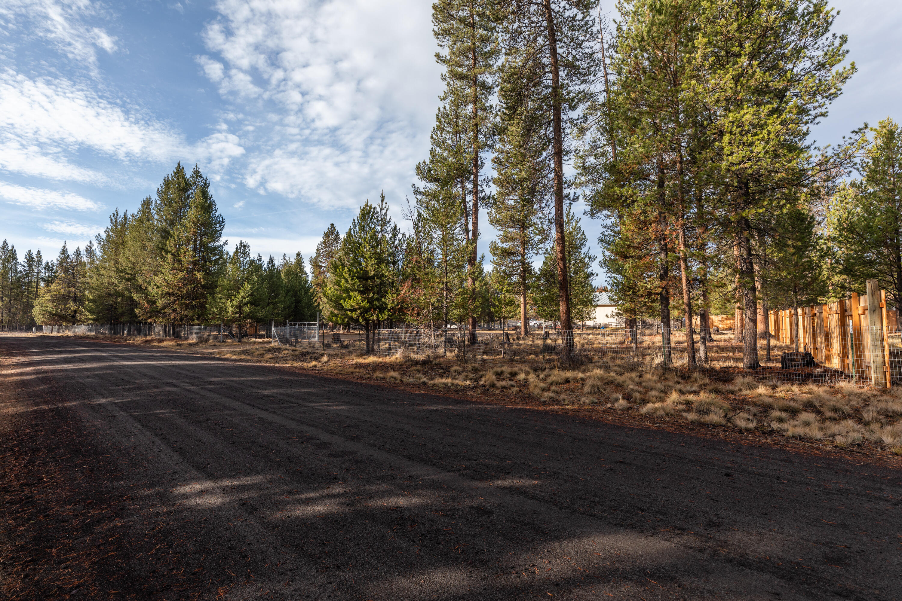 Race ready parcel.  Corner Lot 1.06 acres, fully fenced.  New well drilled and new standard septic system recently installed.  Cute handcrafted wood cook station to use for those summertime cookouts.  Great location to park your RV for a home base and hit all the Central Oregon Lakes. Abundant birds and wild life roaming around and the community maintains the roads and plows the snow in the winter.  Don't miss this great opportunity.
