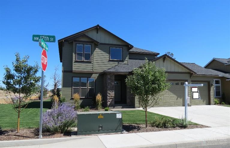 Located in NW Redmond's premier neighborhood of Vista Meadows! 4 bedrooms, 3 full baths and 1,929 SF, including a main floor office/4th bedroom. The interior is light and bright w/an inviting foyer that leads to the open great room which features a cozy fireplace w/custom mantel. The kitchen has tons of cabinets & custom tile work. The master boasts tray ceilings, a spacious walk-in closet & dual sinks. A/C, a 3 car garage, full landscaping w/sprinkler system & rear fencing. This home has great curb appeal!