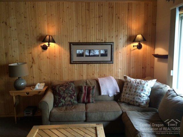 Ski House II with loft. Remodeled, furnished and freshly painted. Kitchen has solid slab granite, custom cabinetry, black appliances. Open concept living area w/ gas fireplace and flat screen TV, vaulted ceiling. Main level master bath has granite counter and tiled tub/shower. Free standing A/C unit. Amenities include: clubhouse, pool, hot tubs, tennis courts, direct access to Deschutes River Trail, downtown, Old Mill Dist.