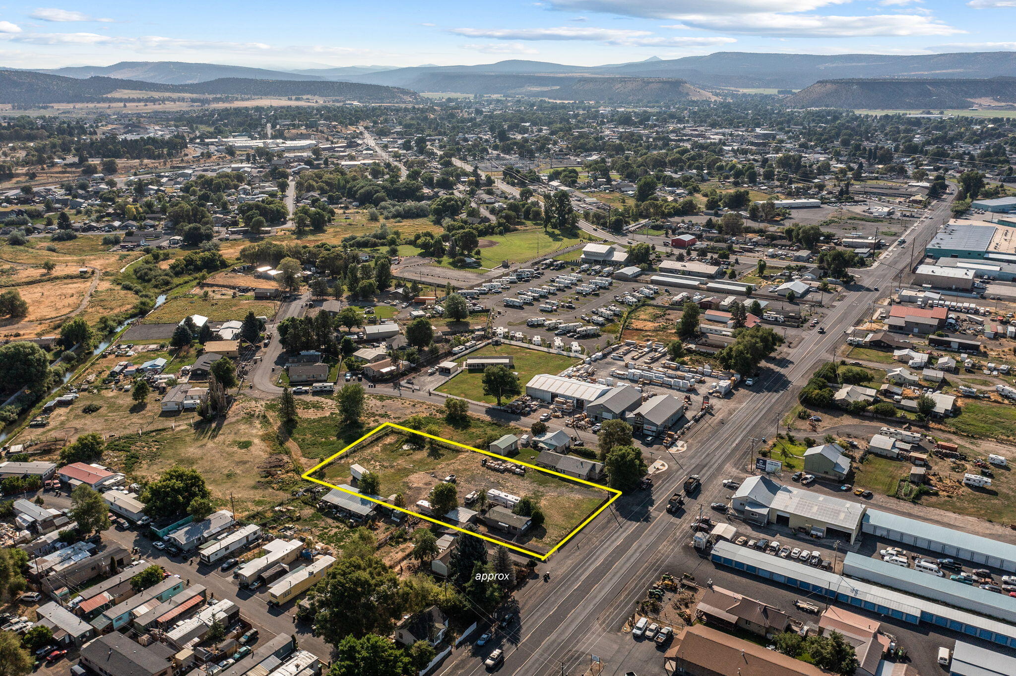 Don't miss this opportunity to own a one acre parcel with incredible visibility, nearly 150 feet of US Hwy 26 frontage! Property is zoned C2 and can be either residential or commercial use. A fully fenced acre with two front gated entrances. Utilities are all connected on site; city water, electric & gas. 6'' commercial sewer line installed to the property. Growth potential in an expanding city provides ample opportunity for business & residential opportunities. Potential investment ideas include but are not limited to: RV Park, tiny homes cluster, work/live opportunity, storage units, food carts, multi-family dwellings, manufactured homes allowed, the possibilities are endless... bring your imagination! Whether you're a seasoned investor or a first-time buyer, this lot is a perfect fit for anyone looking to capitalize on commercial or residential real estate opportunities in a growing community!