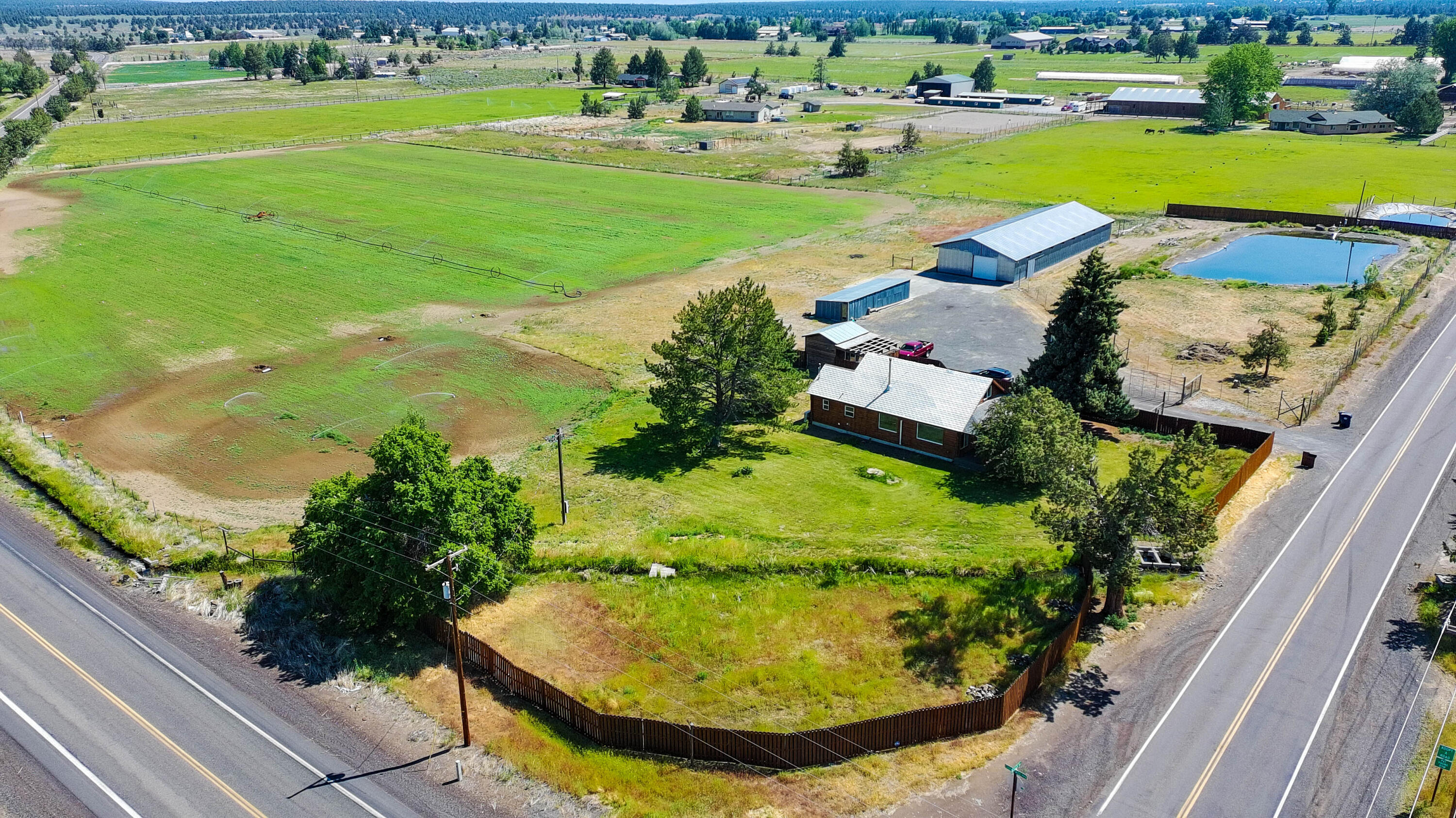 Located in desirable Tumalo, zoned MUA 10 and close to recreational activities such as BLM & the Deschutes River, this charming 9-acre 1940's homestead is a gem & where an ADU or possible second home for multigenerational living or commercial business is allowed. Home has numerous updates, including picture windows to highlight gorgeous mountain views, a ductless mini split w/AC, a new woodstove plus newer paint, trim, electrical & plumbing. The home also features soundproofing, mature trees, a beautiful lawn, front porch & rear deck. Property has a newer, large pond, 3888sqft. barn w/stalls, chicken coop w/storage, pumphouse, private well, gated driveway & perimeter fencing. This idyllic parcel has 6.4 acres of irrigation w/new upgrades to the system this season (apx. 4600' of underground main & irrigation lines, wheel line & pump improvements) plus a newly seeded 6-acre pasture. Move in ready or develop to your liking! 2ND DWELLING ALLOWED HISTORIC DESIGNATION 1945 CLA FOR DETAILS