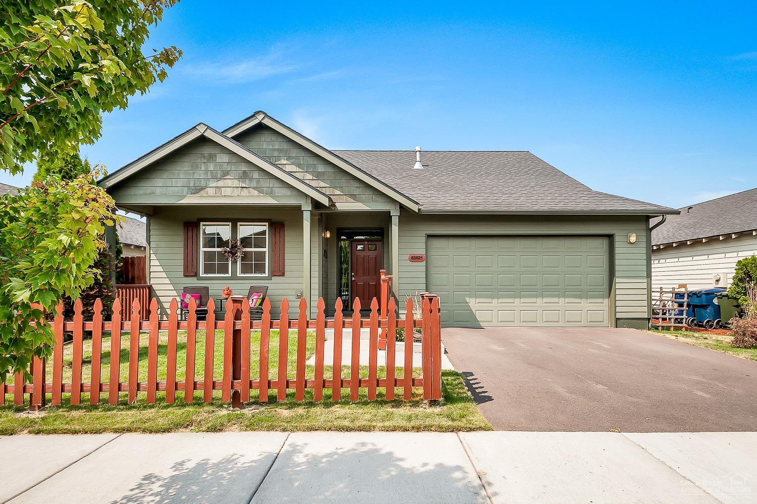 Beautiful inside and out! This immaculately cared for home shows pride of ownership from the minute you drive up. Enjoy the space of the open great room floor plan, new carpet, lovely kitchen with slab granite counters and breakfast bar, gas fireplace, master suite with tiled shower and separate entrance to the lovely back patio. Spend hours entertaining in the beautifully landscaped backyard and large back deck of this home. Close to shopping and easy access to Hwy 97. See attached 3D virtual tour. Move In