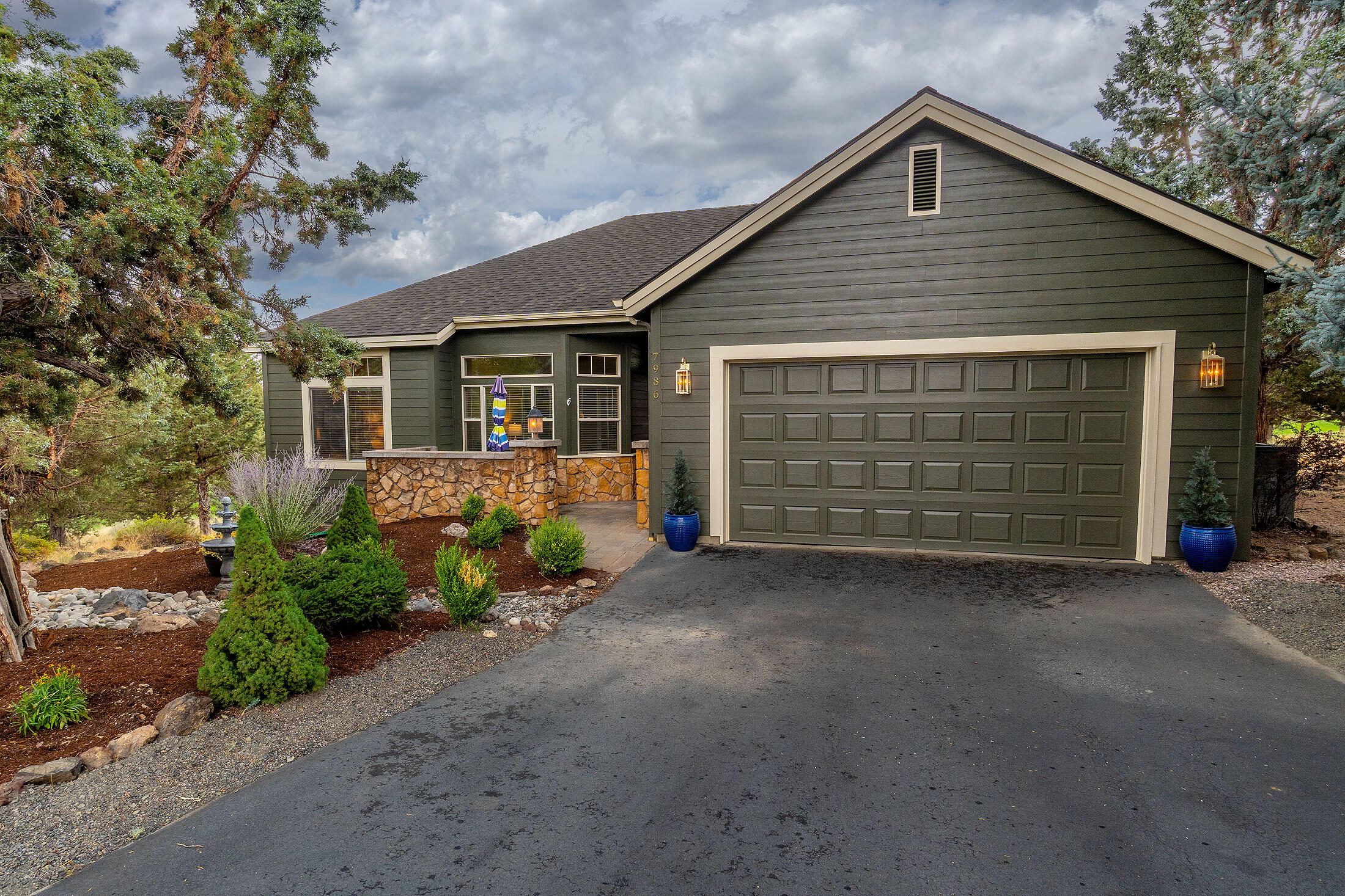 This beautifully updated single-level home in The Falls 55+ community of Eagle Crest Resort offers stunning views of the 15th fairway on The Challenge Course! Featuring an open-concept layout with brand-new flooring, interior and exterior paint, and a completely remodeled laundry room with a utility sink, this home is move-in ready. The kitchen boasts granite countertops and new SS appliances, while the primary suite includes a dual sink vanity, walk-in shower and a walk-in closet. A new roof provides peace of mind, and the large deck overlooking the fairway is perfect for relaxing or entertaining while enjoying the serene golf course setting. Enjoy use of The Falls private community clubhouse. Eagle Crest Resort is home to 3 golf courses, 3 sports centers, a spa, restaurants, and miles of trails for hiking, walking and bicycling.