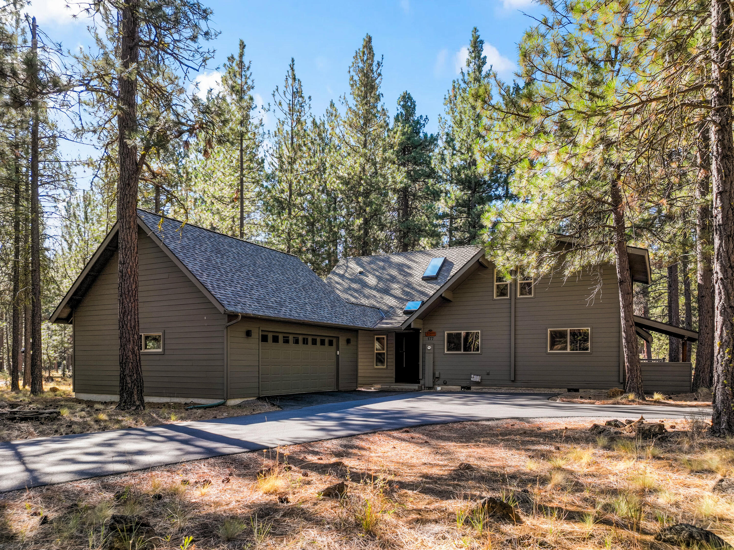Discover one of Black Butte Ranch's best buys. Perfectly situated between the South Meadow Pool Complex and the Glaze Meadow Recreation Facility, this thoughtfully designed residence combines comfort, style, and location. The main-level primary suite, chef's kitchen, and vaulted great room with wood stove create a warm and inviting retreat. With four bedrooms, three baths, an office, and expansive outdoor entertaining deck, there's room for everyone to relax and connect. Recent improvements—including an oversized garage and paved driveway—make this property an exceptional find in one of Central Oregon's most beloved resort communities.