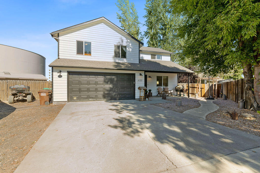 This immaculate home sits on a peaceful cul-de-sac with plenty of room in the front, side and backyard for all landscaping and entertaining desires. Featuring a large primary suite & 2 bedrooms upstairs, each w/their own walk-in closets. A full bath upstairs. Downstairs you'll find a half bath, utility room & an open floor plan. The living space pours into the updated kitchen w/ new cabinet paint & light fixtures. Fridge included. Some updates include: Pavers, sod, fencing, natural gas, appliances, finished garage, garage shelving, fixtures throughout, interior and exterior paint, new garage door, flooring throughout, tile in baths, new windows, & custom fireplace. NEWLY redone backyard with huge patio & the side yard featuring storage, hot tub, & RV/boat space.