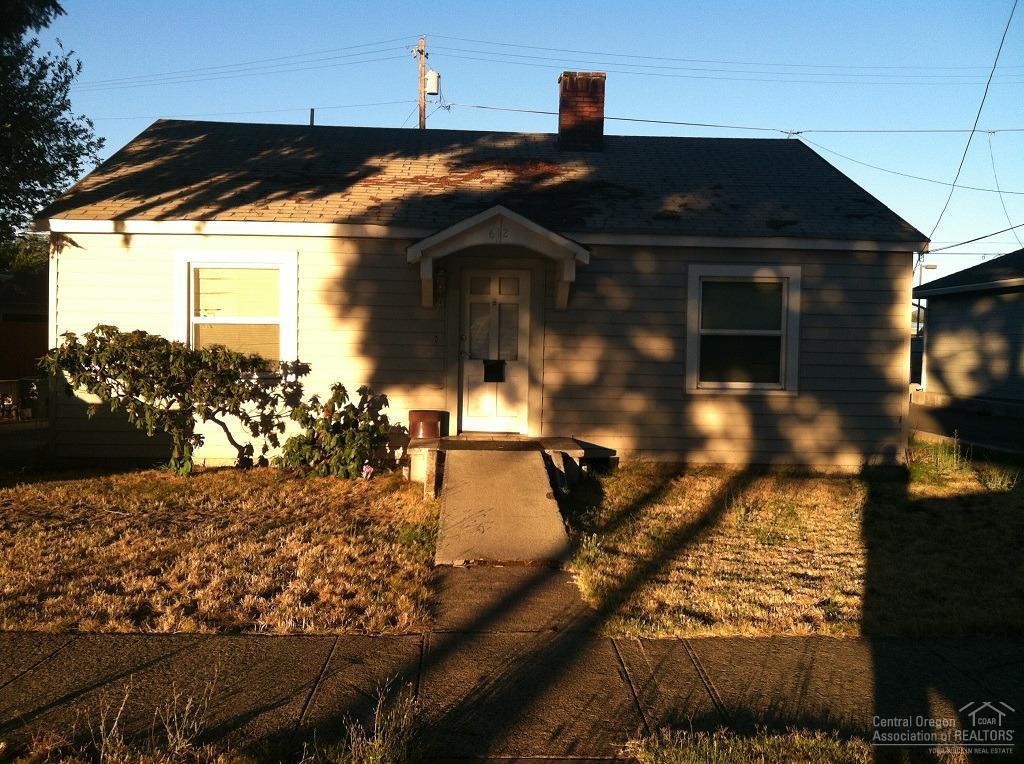Older solid built home, all windows and exterior siding was replaced a few years ago! Interior is a little dated, but lots of upside in this property. Property is zoned Residential and Commercial. Great investment here!
