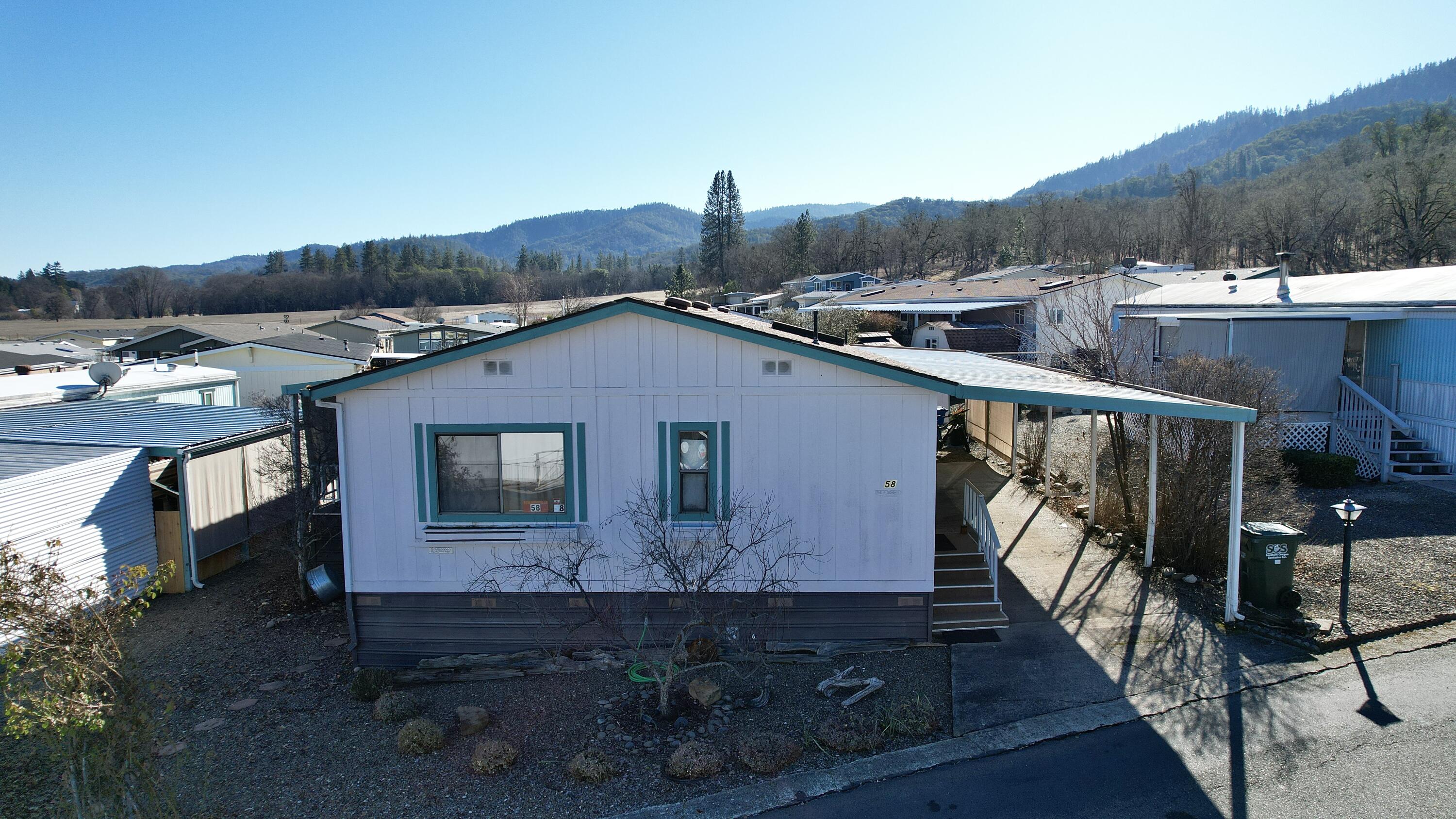 Discover the charm of this well-maintained 1985-built 3-bedroom, 2-bathroom mobile home located in a serene 55+ community. This delightful home boasts new flooring throughout, adding a fresh and modern touch to the cozy interior. The attached carport offers convenience, while the backyard gazebo provides the perfect space to relax and enjoy the peaceful surroundings. Nestled in a quiet rural park with low space rent of only $620 which includes water, sewer and trash. This property offers an inviting lifestyle in a tranquil setting. Don't miss the chance to call this gem your new home!
