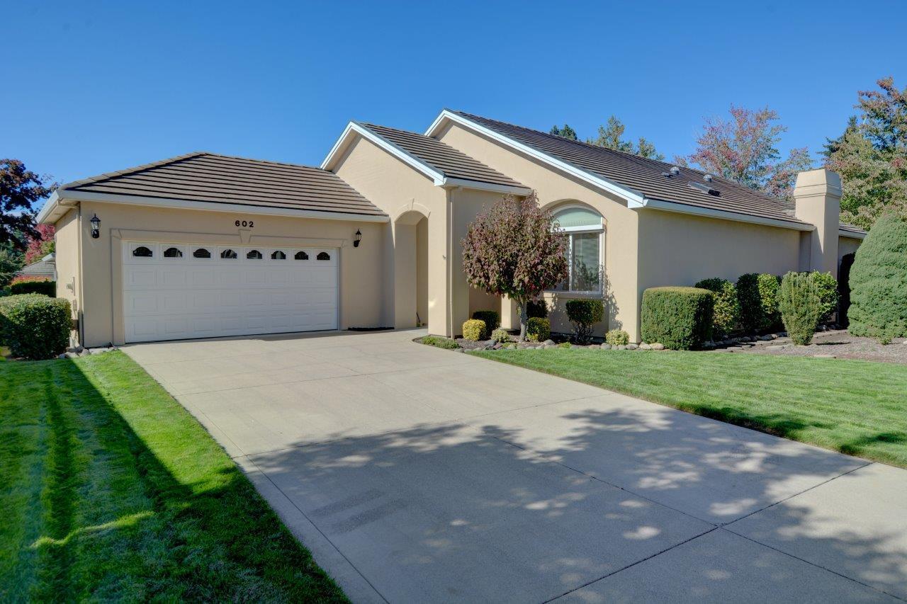 This Lovely 2 bedroom, 2 full bath home ia located in the private Alder Creek gated community close to shopping and medical. The versatile floor plan features 
A large kitchen with adjacent family room, Living/Dining room with soaring vaulted ceiling, a large laundry and a bonus room which could be used as an office. The main attraction in the living room is the custom fireplace mantle. Double doors open to a spacious primary suite with double vanity sinks, walk in shower and walk in closet. The oversized garage provides a work bench and abundant storage.
The Home Owners Association manages 
the landscaping, the security gate and all  common areas.. so you can relax and enjoy your new home.