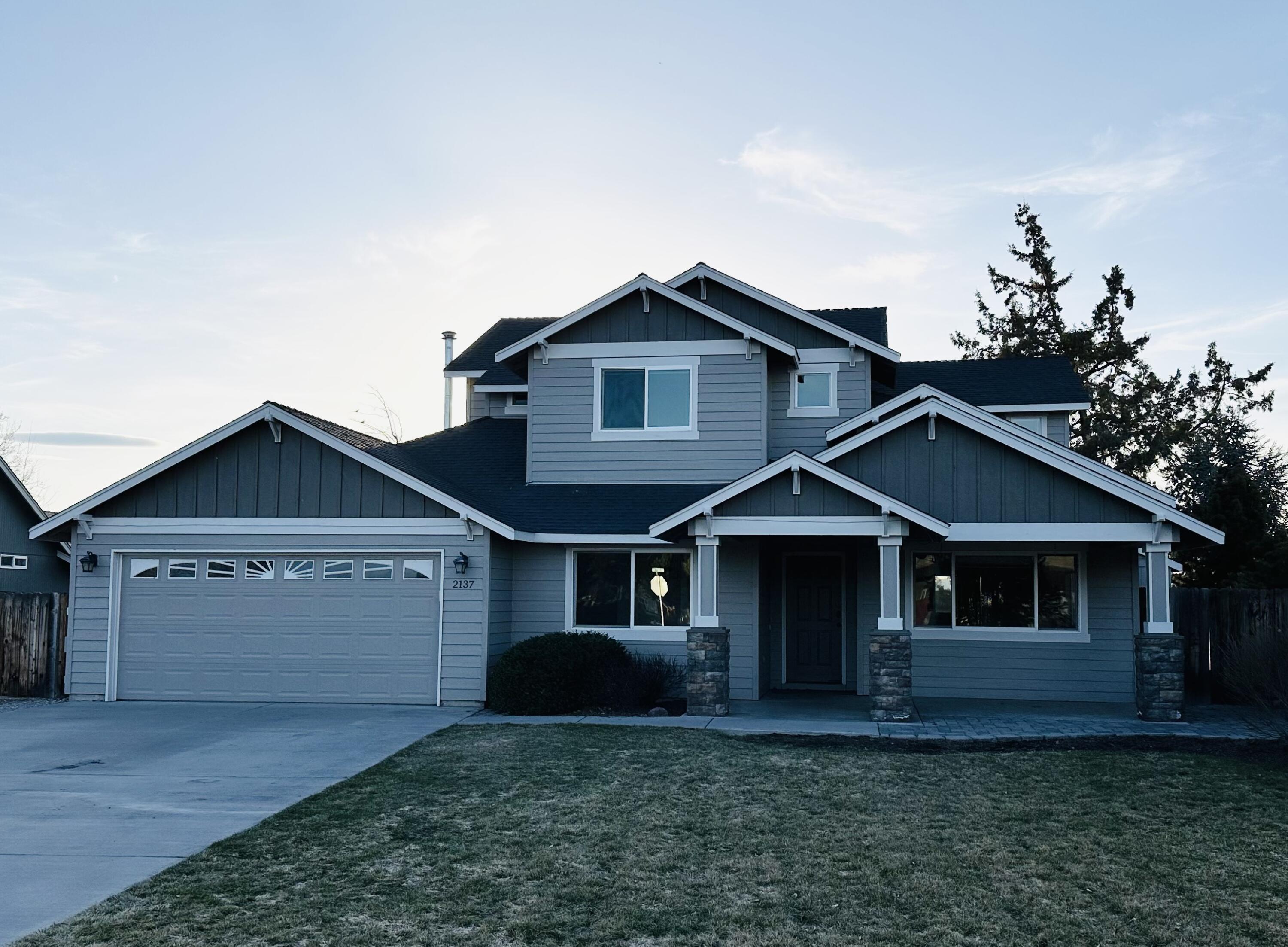 Homes like this don't hit the market often. This home has so much to offer its new owner: enjoy the many beautiful days spending time outside under the covered back patio, the two story playhouse will definitely be a hit, and the Dry Canyon access nearby is the icing on the cake. Make an appointment to see this well maintained 4 bed, 3 bath house on a .21 acre lot in an established and sought after NW Redmond neighborhood. Make this home yours. This home has been recently painted inside and out with nicely updated appliances. The large driveway not only provides additional parking but there is plenty of space to park your RV or other toys.