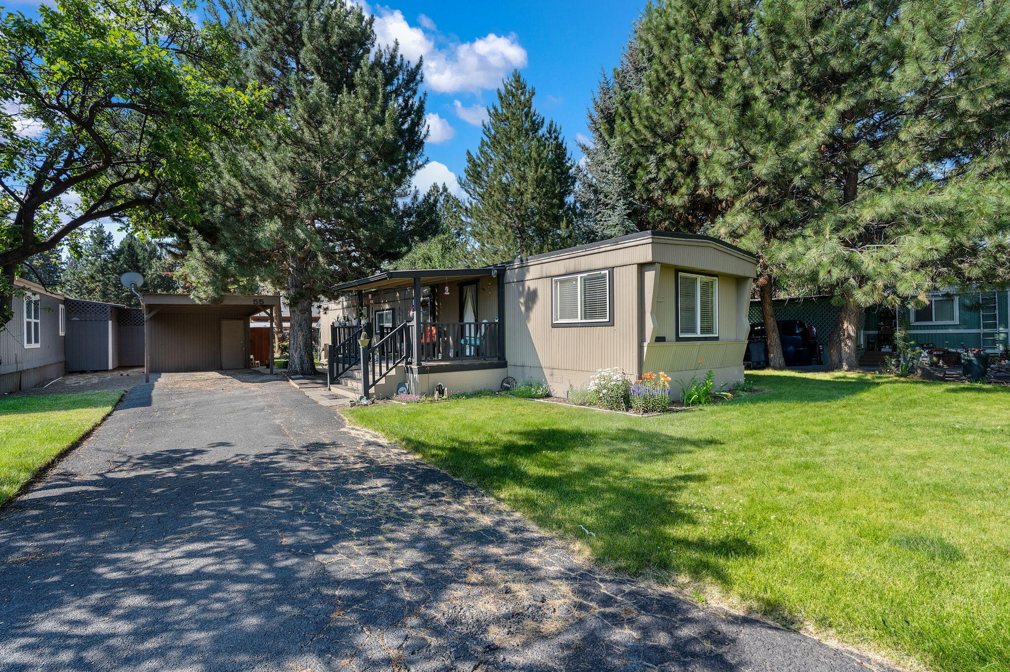 Discover comfort and convenience in this charming single-wide manufactured home located in a welcoming, all-age community on Bend's desirable east side. Just a block away from the exciting new library opening later this year, this home puts you close to shopping, dining, medical services, and all the best amenities Bend has to offer.
Step inside to find tasteful updates including fresh interior paint and easy-care laminate flooring. The home offers a cozy, functional layout with plenty of natural light. Outside, you'll love the vibrant garden bursting with flowers, vegetables, and fruit—a perfect space for relaxing on the large deck or cultivating your green thumb.
Enjoy the sense of community in this friendly park while benefiting from affordable living in a prime location. Don't miss this opportunity to own a slice of Bend at a great value! This home has financing options. Please call your favorite realtor for more information.