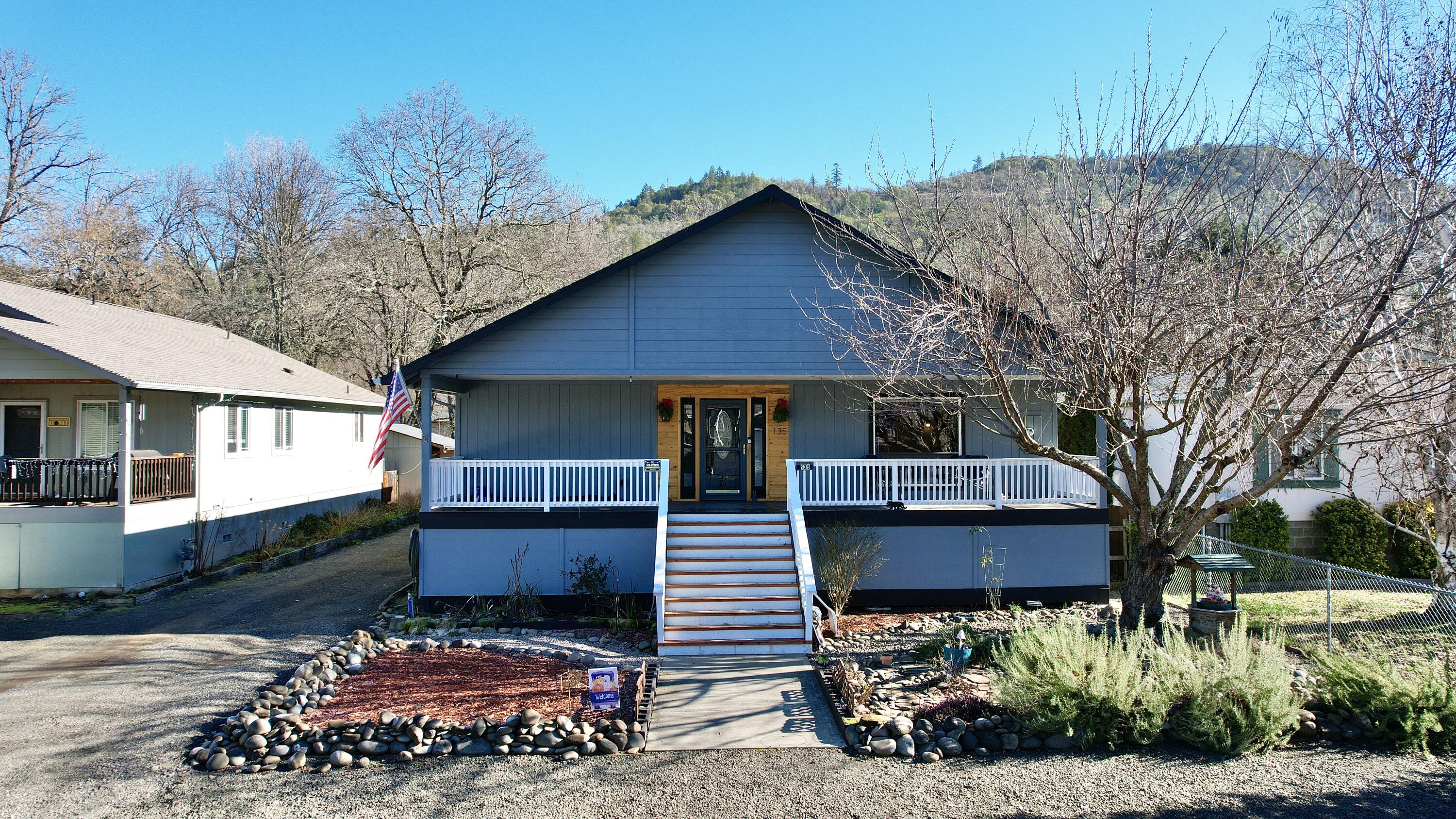 In the heart of Shady Cove within a stones throw away of the mighty Rogue River! Get ready to Cast-A-Line for the salmon or steelhead of your dreams just up the road, or take short ridge to Lost Creek Lake & all the upper Rogue has to offer including endless year-round recreation. This home has it all, including an inviting covered front porch & grand foyer. The spacious open floor plan provides TONS of natural light. Beautiful laminate flooring & built-ins throughout. Bathrooms have been redone to perfection & include heated flooring & more. New interior paint, newer appliances & freshened up cabinets are some of the recent upgrades. Situated just 18-miles from Rogue Valley International Airport, this almost ¼-acre lot features a flat fenced backyard & low maintenance landscaping, all ready for you to entertain & park all your toys. The attached oversized 2-car garage features plenty of room for your things plus has a great shop area for your projects along with TONS of storage.