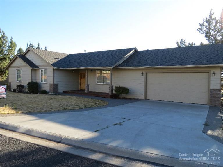 Beautiful single level home in SW Redmond's Valleyview addition. 3 large bedrooms or 2 and a den, this home has quality to show. Open living, dining, kitchen area with vaulted ceiling, very light, bright and spacious, warm fireplace for those cold nights. Spacious kitchen with eating bar and tile backsplash, has nook for morning coffee. Large master bedroom with walk-in closet, double sinks and a huge walk-in shower. Forced air gas with AC this home has great curb appeal and includes a double car garage.