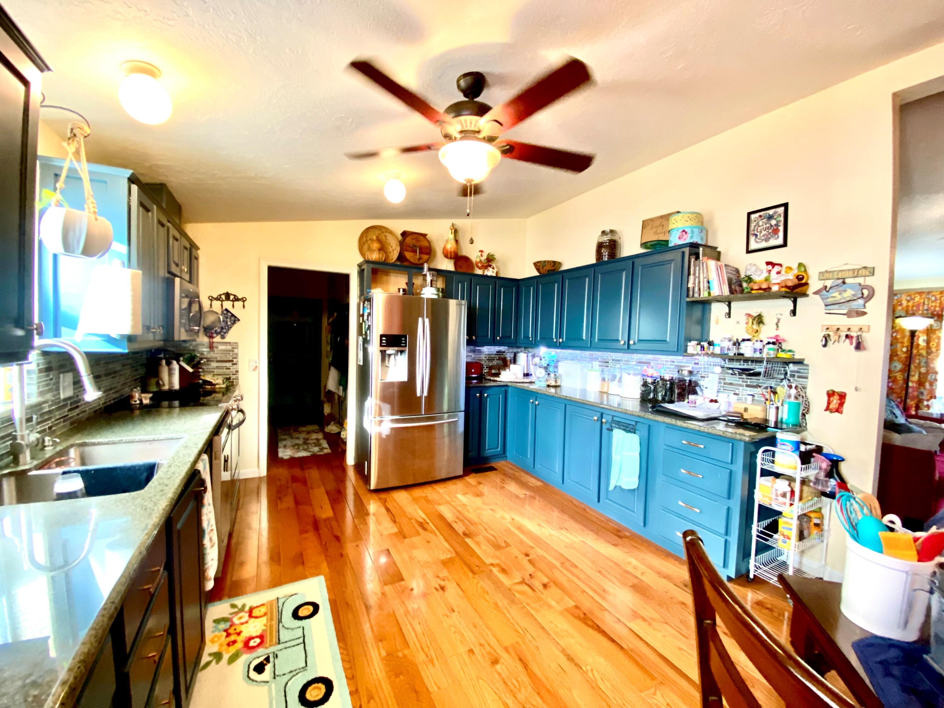 Beautiful updated home with shop/additional living space which include bunk beds, heat and room for small refrigerator. Vaulted ceilings with ceiling fans.  Newer heat pump, real redwood flooring, granite counter tops, high end blue cabinets, glass backsplash + stainless stain appliances. Great master separation with sliding glass doors leading out to covered porch with trex decking. Manufacture home only. NO LAND. Monthly space rent $785 includes water, sewer and snow removal. All occupants need park approval with credit and background check.
