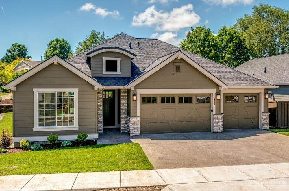 Featuring a single level plan that includes a dramatic great room with vaulted ceilings; the Pahlisch Carrington floorplan is over the top with an open and inviting kitchen offering an excellent dining space for you and your family/guests to enjoy. Quartz countertops, quality cabinets, under-mount sinks and luxury vinyl plank flooring throughout! Relax in your master suite with a coffered ceiling and master bath featuring a large soaking tub, double vanity and walk-in closet. Includes a spacious 3 car garage for all those toys! You'll love evenings on the covered patio, or relaxing by the cozy gas fireplace. As in all Pahlisch Homes, well-crafted finishes are used throughout. Triple Ridge is a quality neighborhood located close to Ridgeview High School. Let the HOA care for your front yard and enjoy summers in your community swimming pool! Come see why Pahlisch has won 150+ Quality & Value Awards! Photos are of similar home, specifications vary.