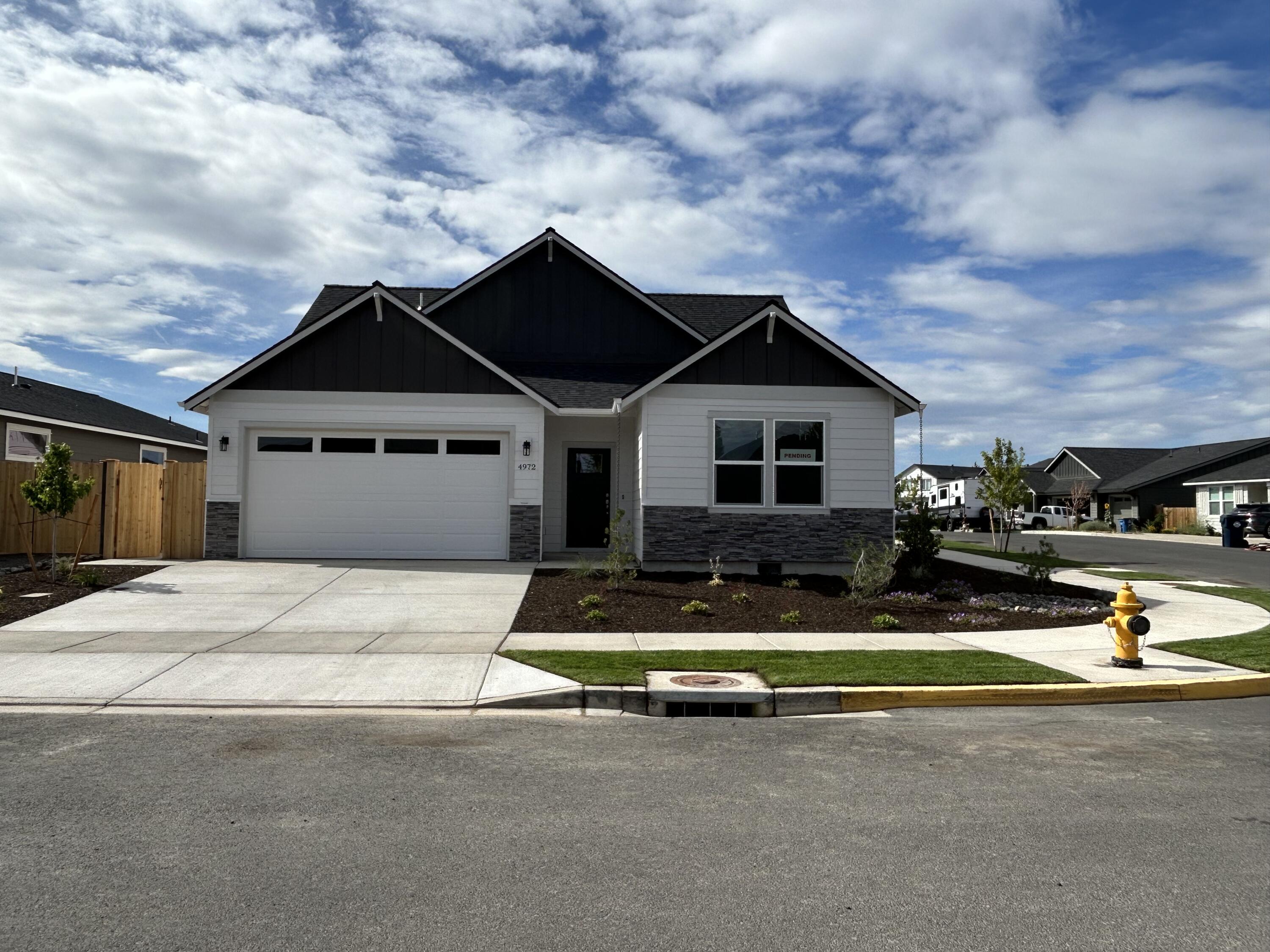 Built-in ADU! Under construction- est. completion mid July. Lot 31 features the Parker floorplan w/ 1,572 sf main living w/ 3 bdrms, 2 full baths and attached ADU w/ 660 sf. Upgraded features include A/C, quartz counters, full tile backsplash, fenced backyard w/ landscaping & sprinklers. Entertain in your kitchen w/ SS appliances, walk-in pantry, full height tiled backsplash, soft-close cabinets opening to dining area & great room w/ decorative fireplace. Durable laminate plank flooring thru-out w/ carpeted bdrms. *Rendering & floorplan subject to change. Main home natural gas. ADU electric.