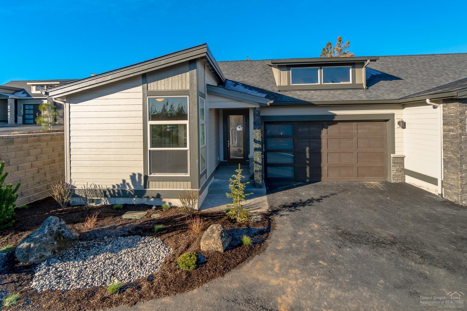 Charmingly placed between the Deschutes River & The River's Edge Golf course, you'll find the distinguished new home community, The Pointe at River's Edge. Choose between luxury townhomes or single family homes. You'll love the private access to the river that this community affords. MOVE IN READY, this versatile NEWMAN TOWNHOME you'll experience an open floor plan offering engineered hardwood flooring in the living areas, great room with gas fireplace and built ins, gourmet kitchen with walk in pantry and wet bar, quartz counters and large breakfast bar, master suite separation with tile floors & shower, double vanity and large walk in closet, den/3rd bedroom, large laundry/mud room off extended garage, and golf course views. Included are numerous Smart home features that complete this beautiful home. Please view attached virtual tour. Photos are of like model.