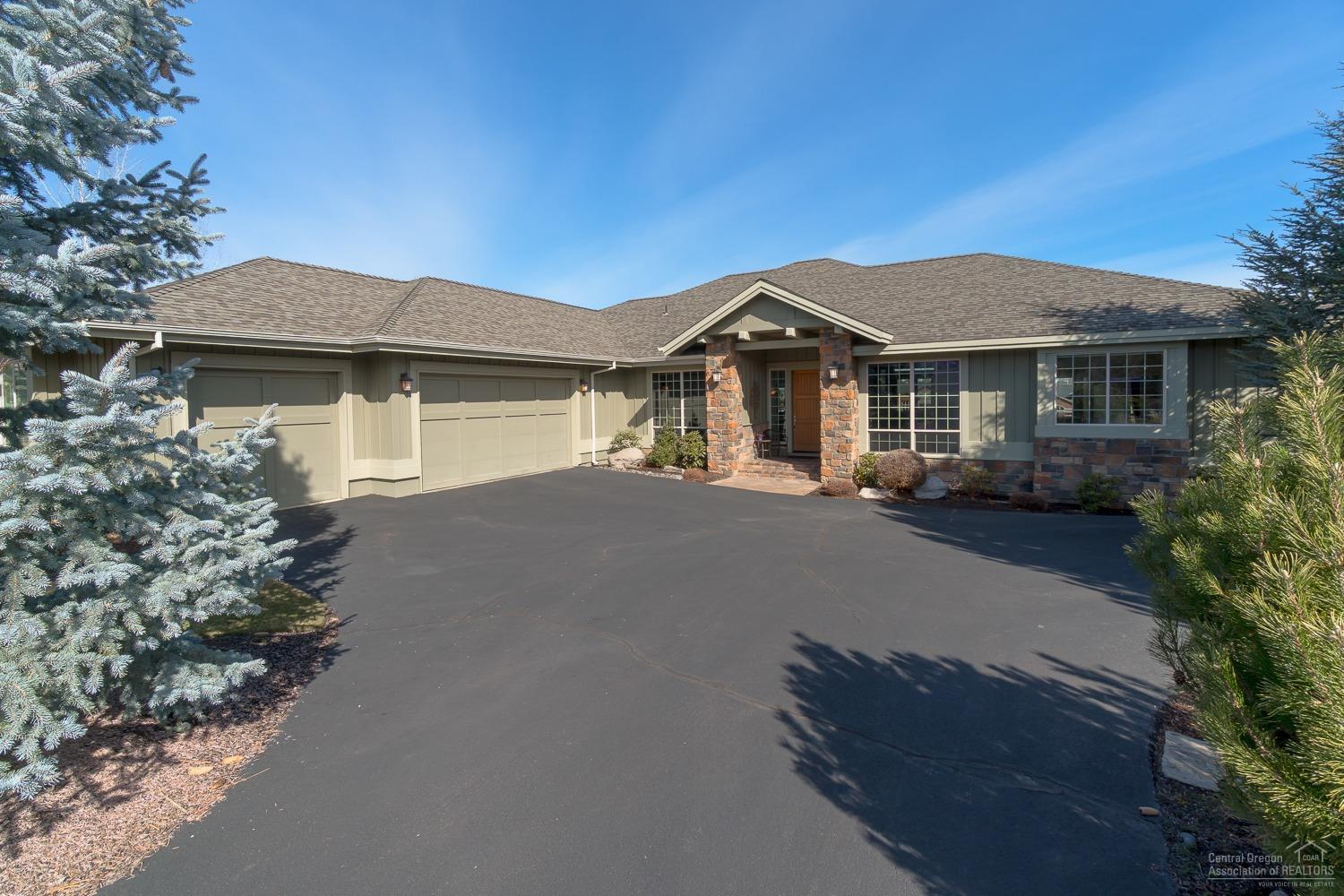 Resort living at its best! Gorgeous one level home on the 12th fairway of The Ridge Course in Eagle Crest Resort. Great room plan features soaring ceilings, built-ins & gas fireplace. Gourmet kitchen with slab granite, gas cooktop & stainless appliances. Master suite with huge walk-through closet & pocket doors. Double vanity with slab granite, soaking tub & separate shower. Two guest suites with walk-in closets & Jack & Jill bath. Den could be 4th bedroom. Expansive deck with beautiful views.